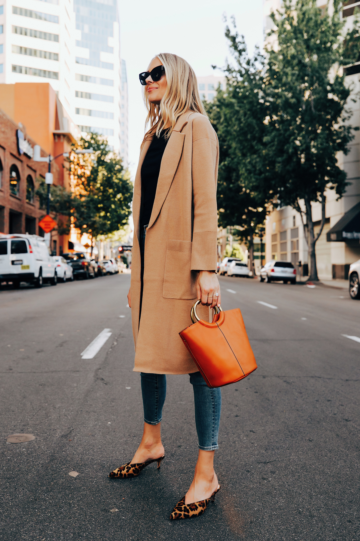 Fashion Jackson Wearing Jcrew Camel Long Sweater Coatigan Black Tshirt Denim Skinny Jeans Cognac Bucket Bag Leopard Mules Fall Outfit