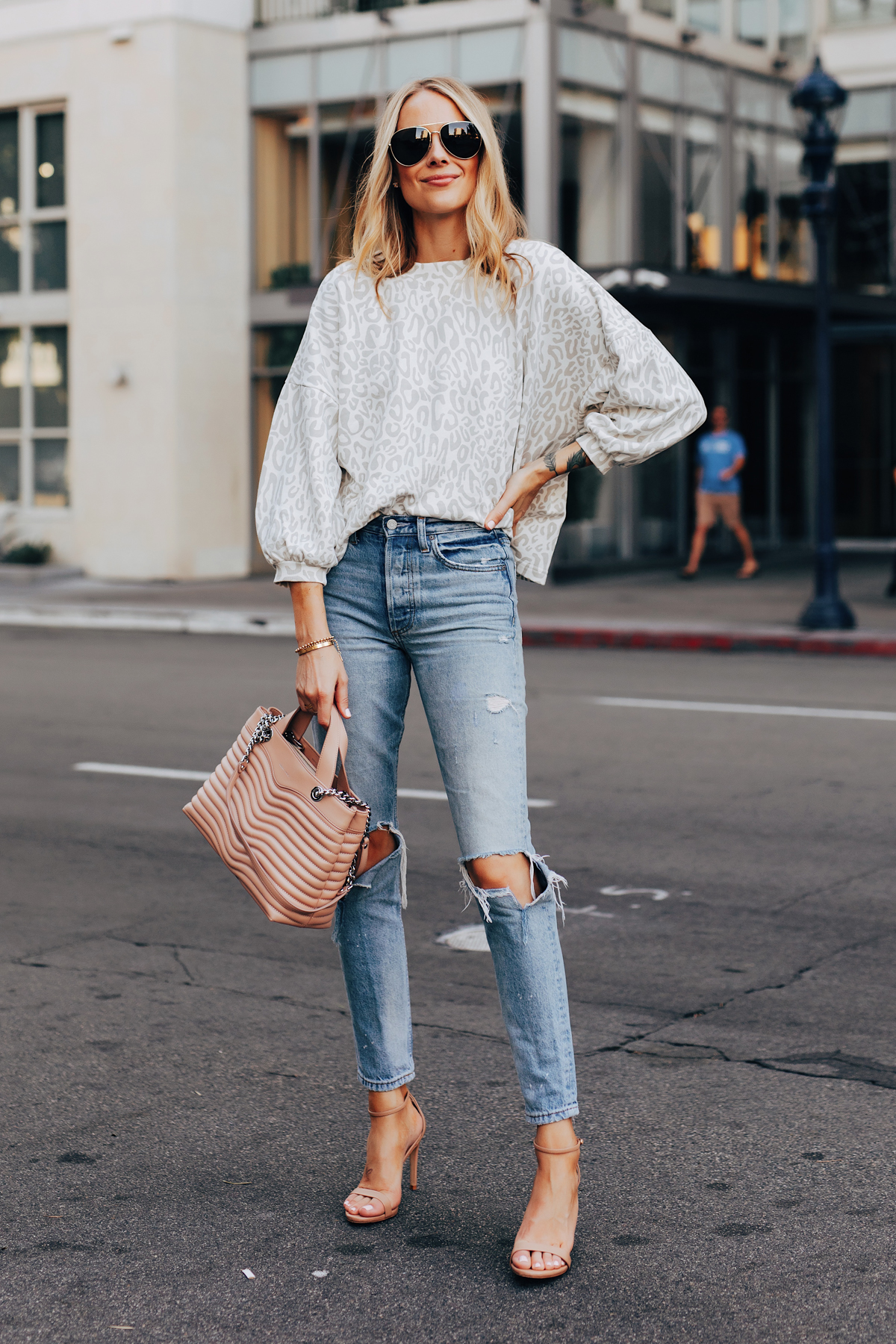 Fashion Jackson Wearing Rebecca Minkoff Leopard Sweatshirt Ripped Jeans Tan Ankle Strap Heeled Sandals Aviator Sunglasses Rebecca Minkoff MAB Quilted Satchel Blush