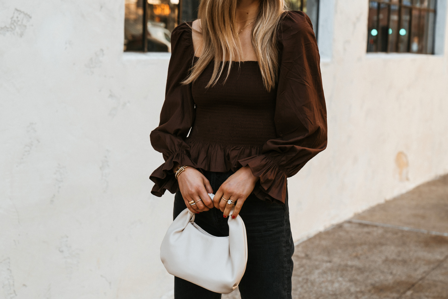 Fashion Jackson Wearing Reformation Brown Smocked Top Black Jeans White Handbag 1