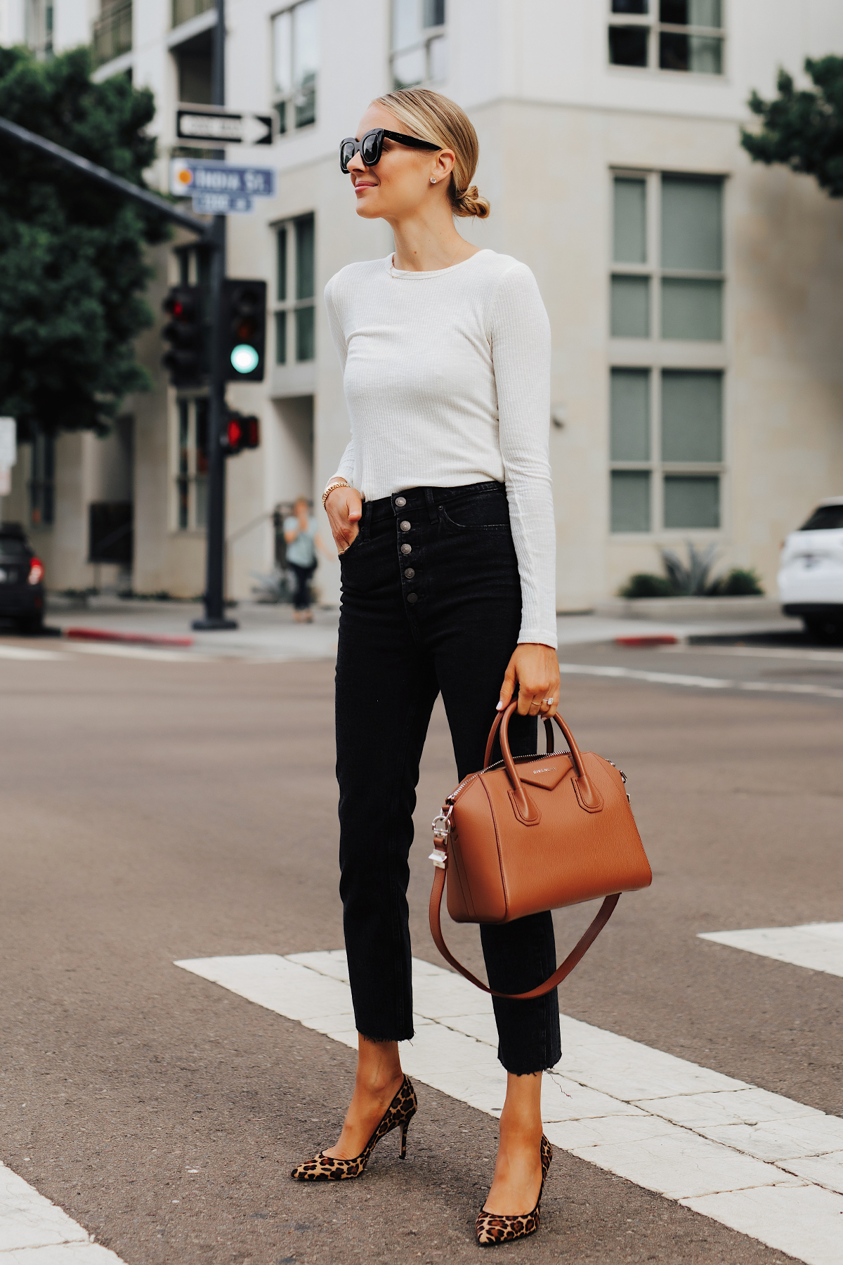 Fashion Jackson Wearing White Long Sleeve Top Black Raw Hem Jeans Leoaprd Pumps Givenchy Antigona Cognac Handbag