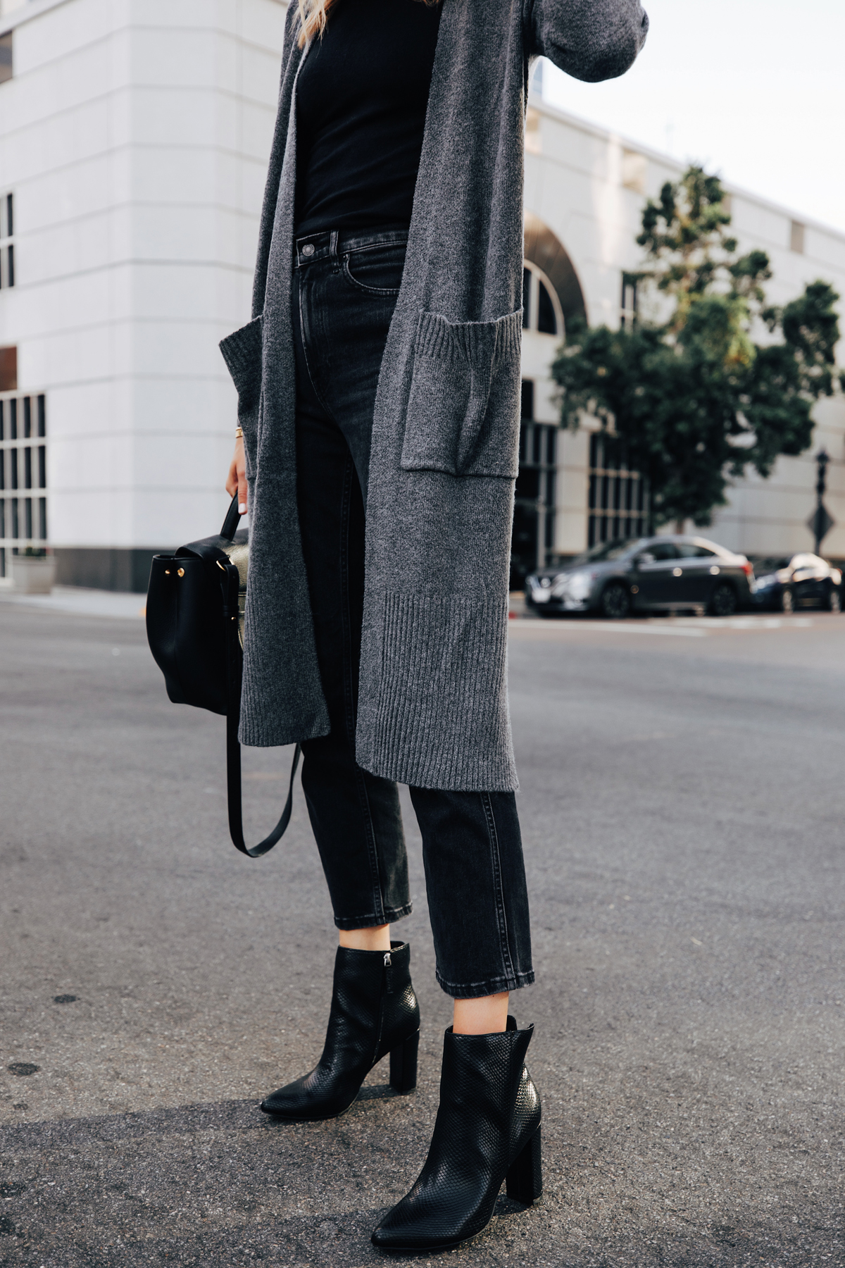 Fashion Jackson Wearing Long Grey Cardigan Black Cropped Jeans Black Snakeskin Booties