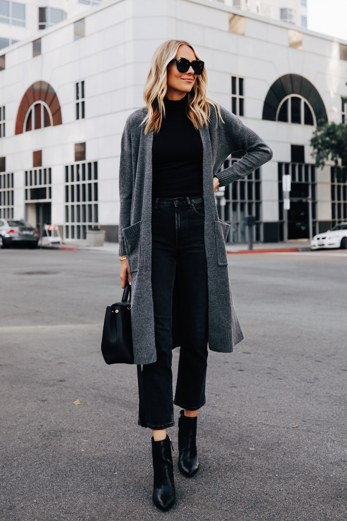 Fashion Jackson Wearing Walmart Scoop Long Grey Cardigan Black Top Black Jeans Black Snakeskin Booties 2