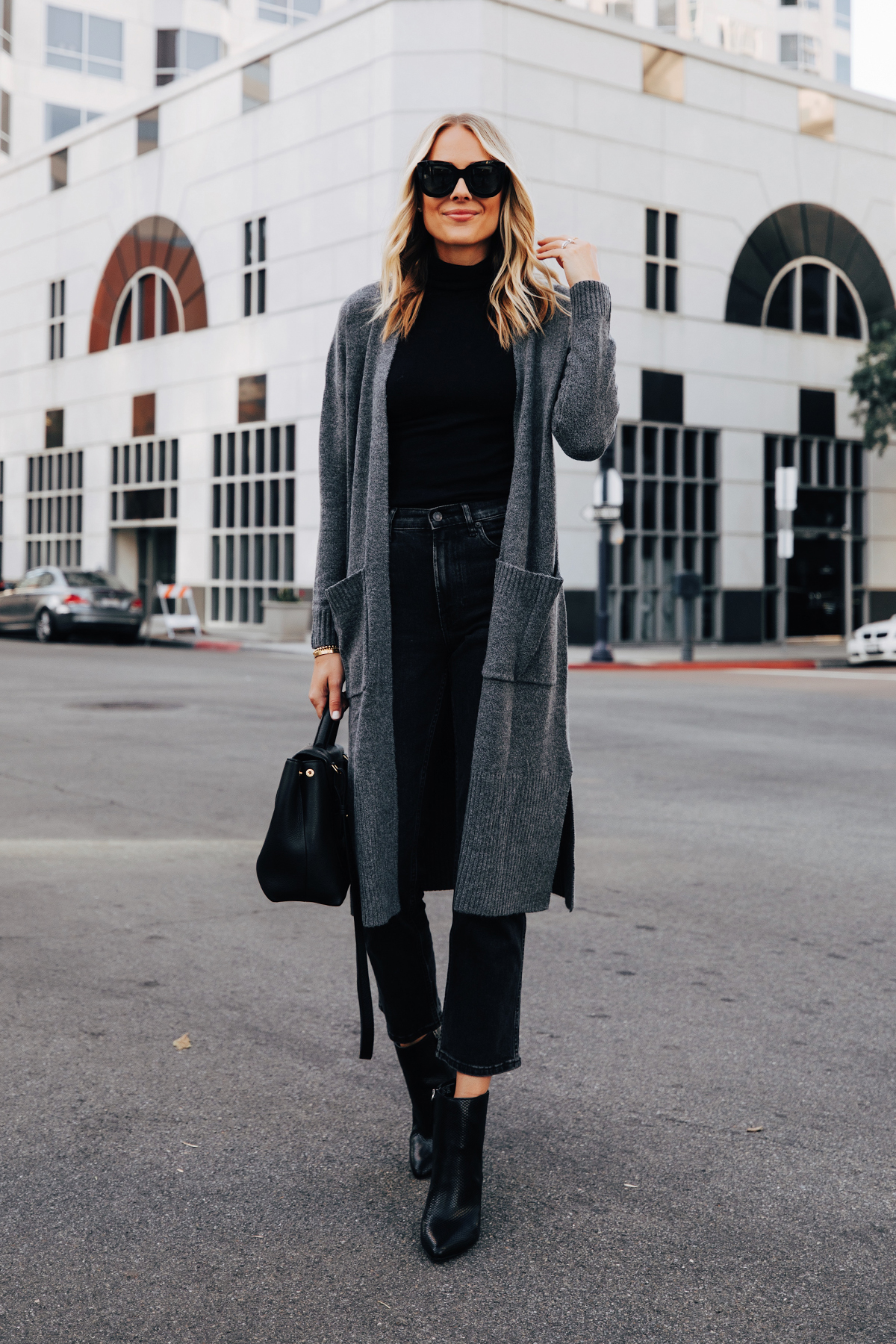 Fashion Jackson Wearing Walmart Scoop Long Grey Cardigan Black Top Black Jeans Black Snakeskin Booties