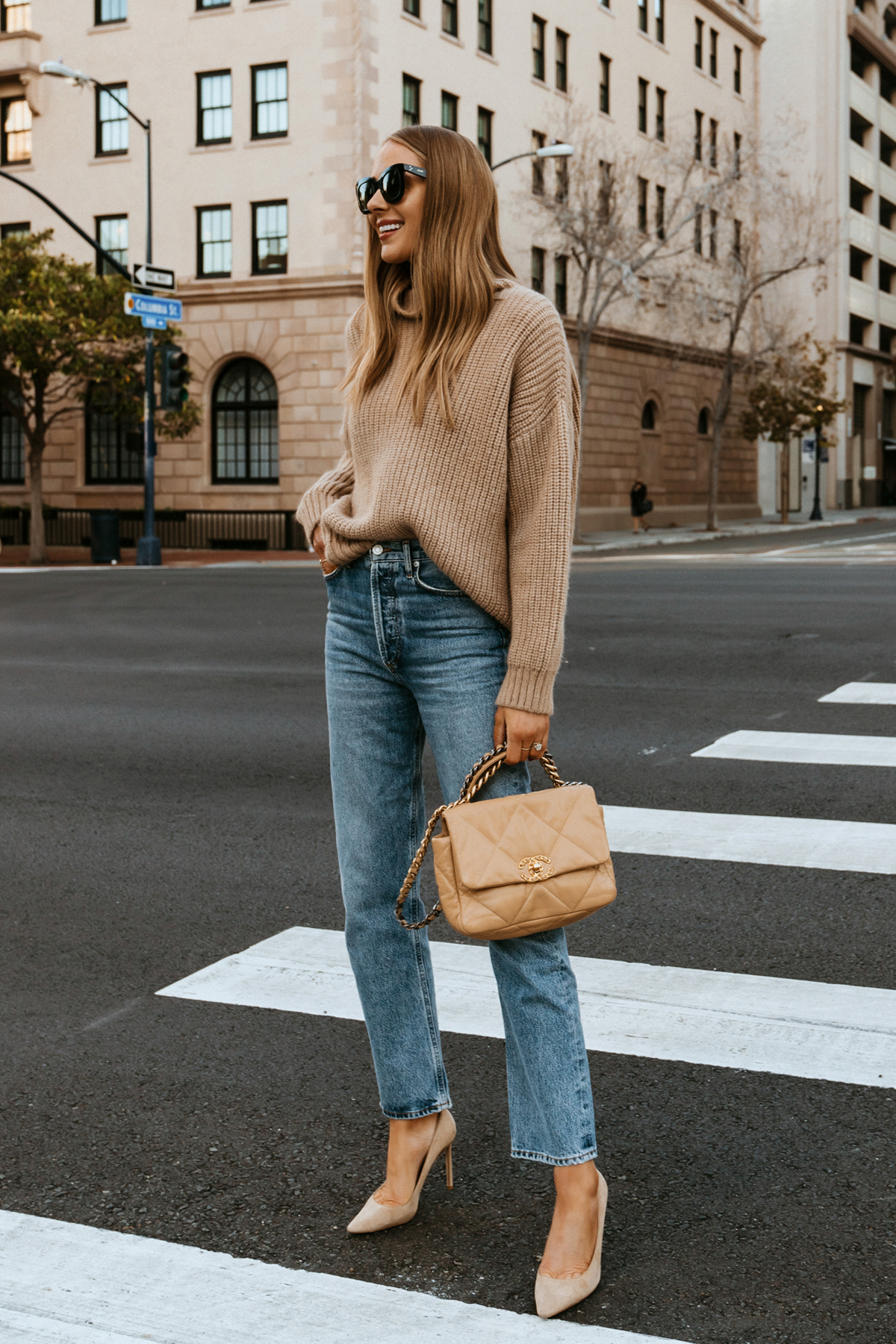 Fashion Jackson Wearing Anine Bing Sydney Sweater in Camel Turtleneck Sweater AGOLDE 90s Jeans Nude Pumps Chanel 19 Beige Handbag