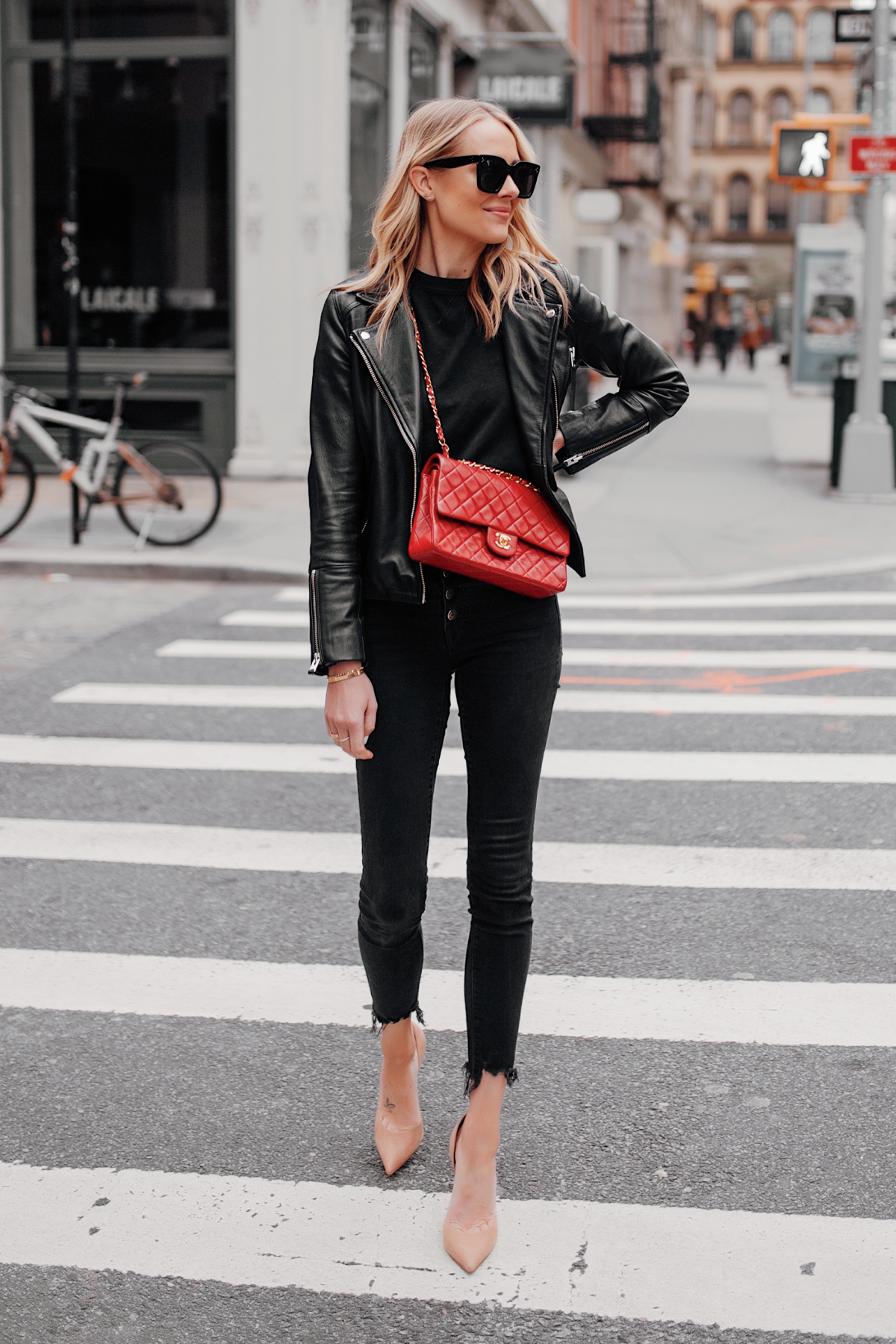 Fashion Jackson Wearing Black Leather Jacket Black Skinny Jeans Red Chanel Handbag Nude Pumps NYC Street Style 1