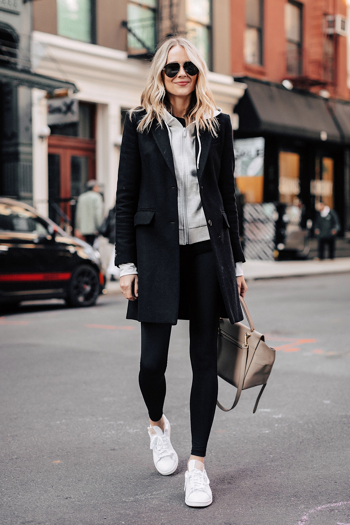 Fashion Jackson Wearing Black Wool Coat Grey Hoodie Black Leggings adidas white Stan Smith Sneakers NYC Street Style 1