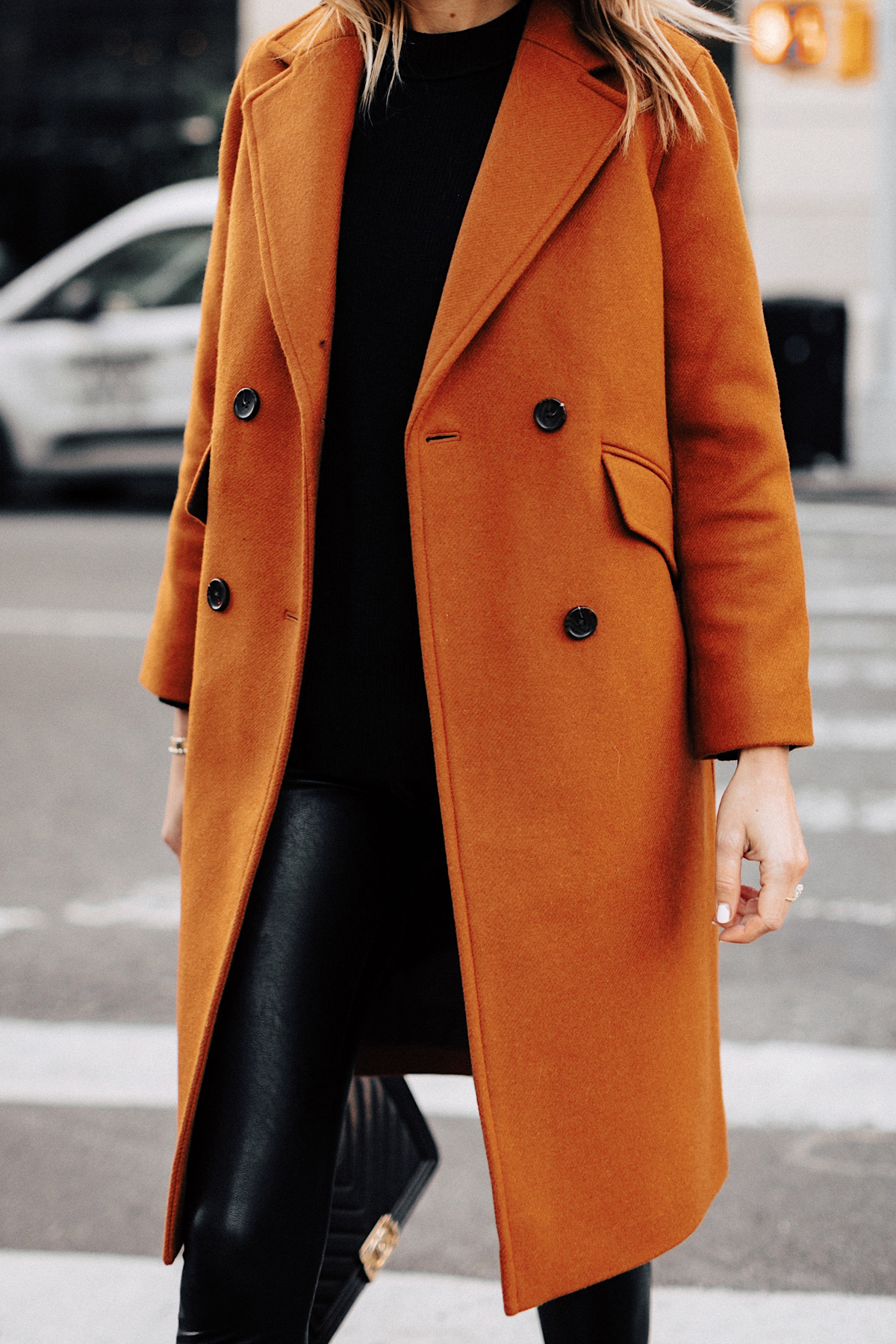 Fashion Jackson Wearing Everlane Dark Camel Wool Coat Black Sweater Black Faux Leather Leggings