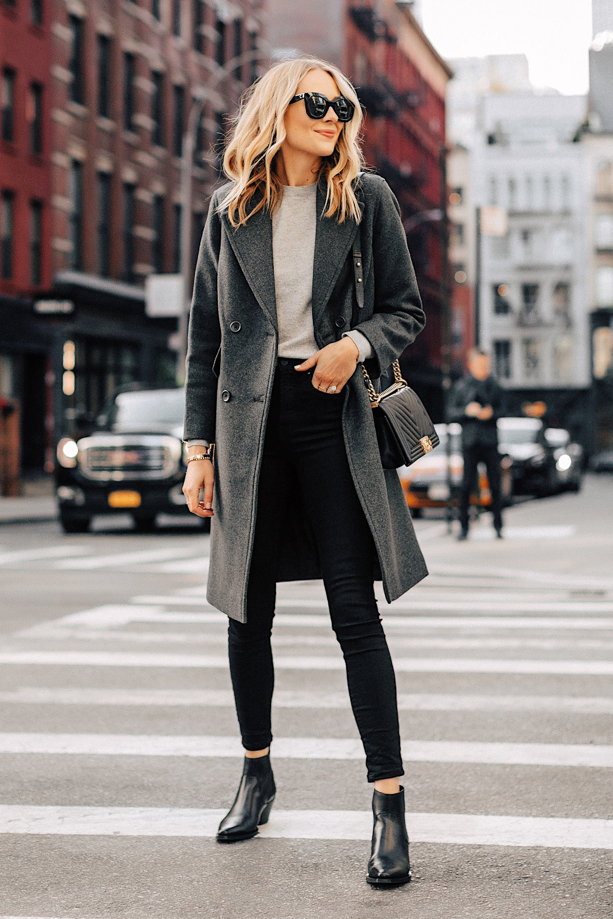 Fashion Jackson Wearing Grey Everlane Wool Overcoat Grey Sweater Black Skinny Jeans Black Booties New York Street Style
