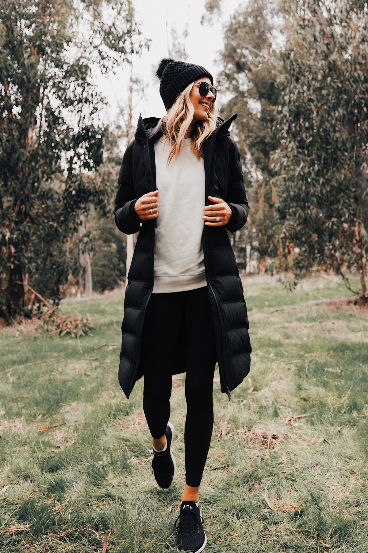 Fashion Jackson Wearing lululemon Black Sleet Street Long Jacket Black Beanie Black Leggings hikes in San Diego