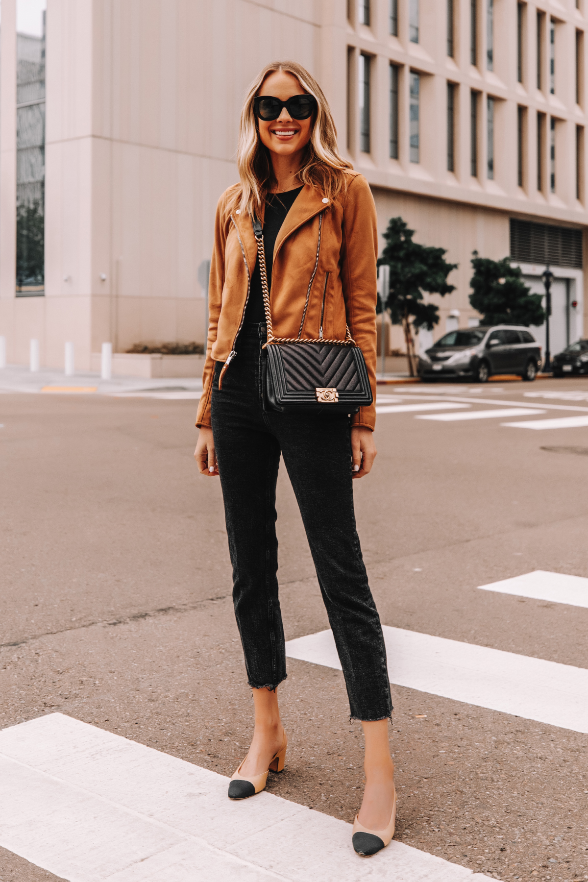 Black leather moto clearance jacket with gold hardware