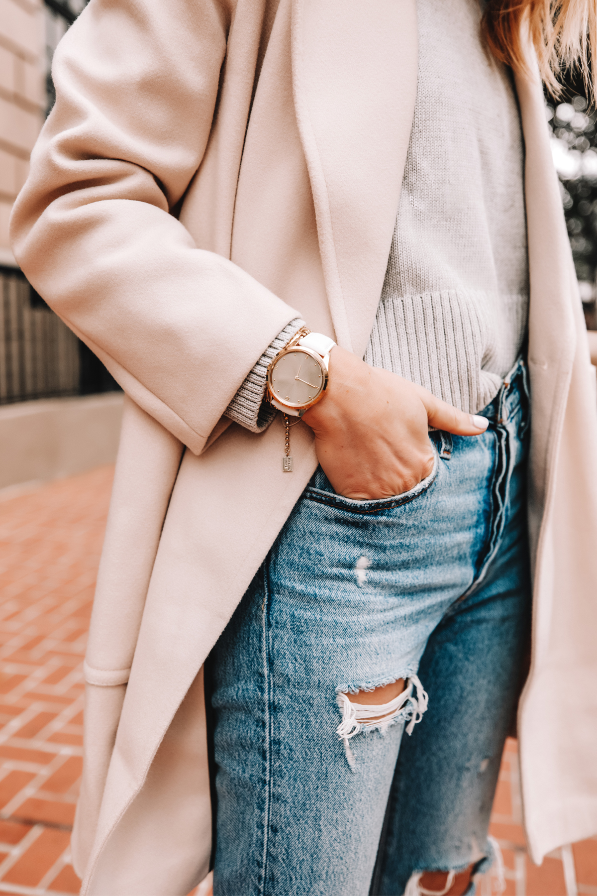 Fashion Jackson Wearing Beige Coat Grey Sweater Ripped Jeans Garmin Vivomove Luxe Watch