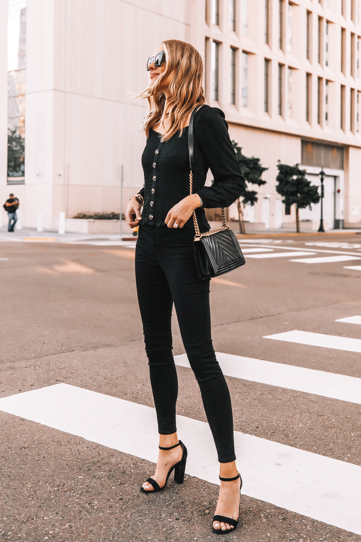 Fashion Jackson Wearing Long Sleeve Black Button Front Top Black Skinny Jeans Black Heeled Sandals