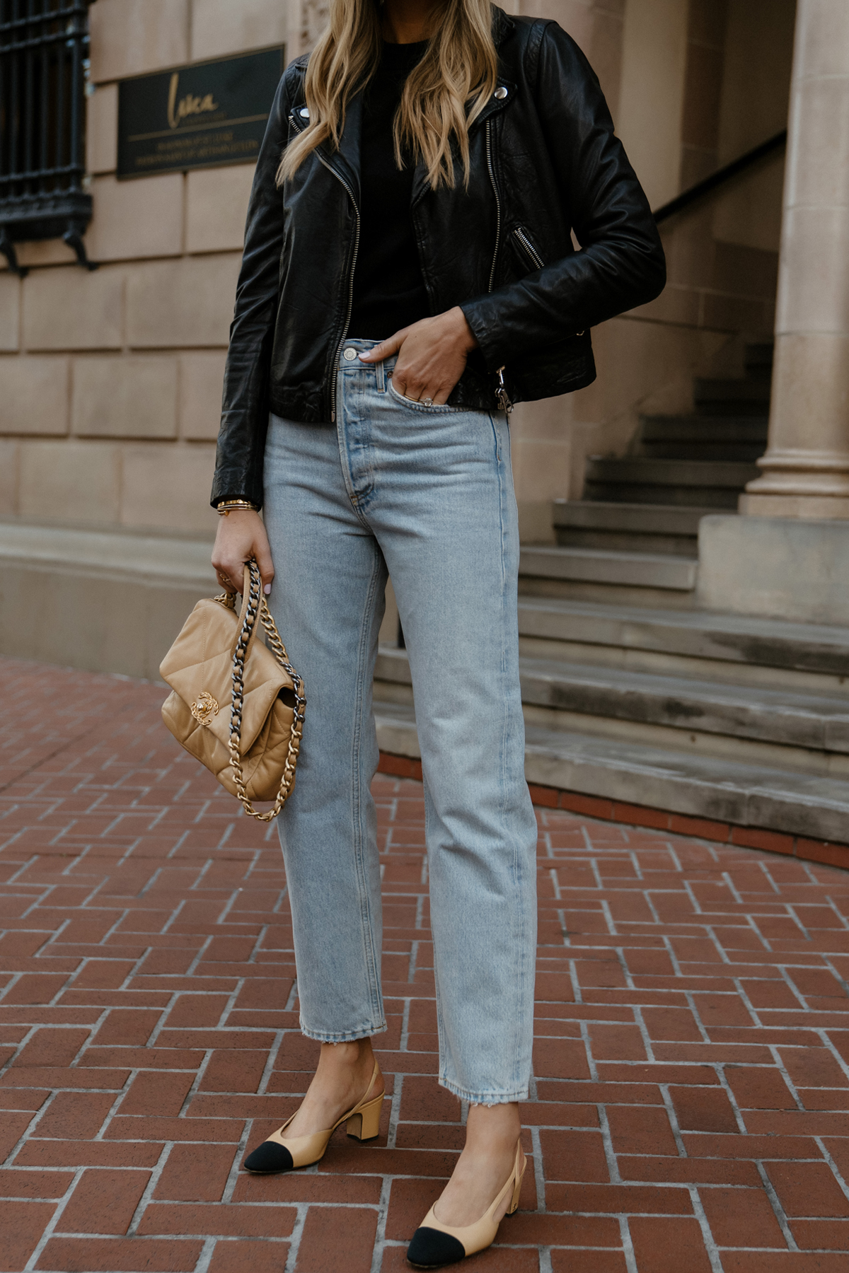 Fashion Jackson Wearing Madewell Black Leather Jacket AGOLDE 90s Jeans Outfit Womens Black Leather Jacket Outfit Chanel Slingbacks Chanel 19 Beige Handbag