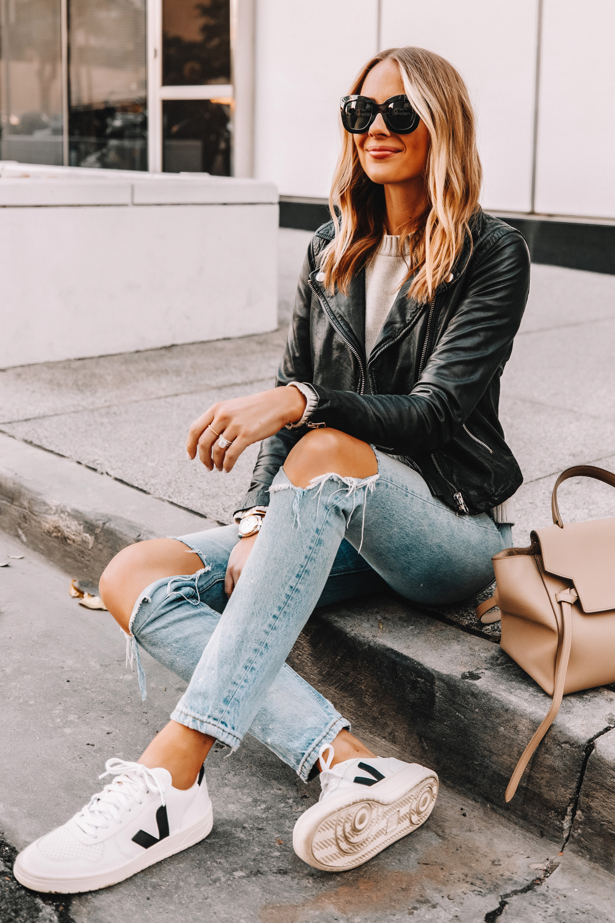 leather jacket and sneakers outfit