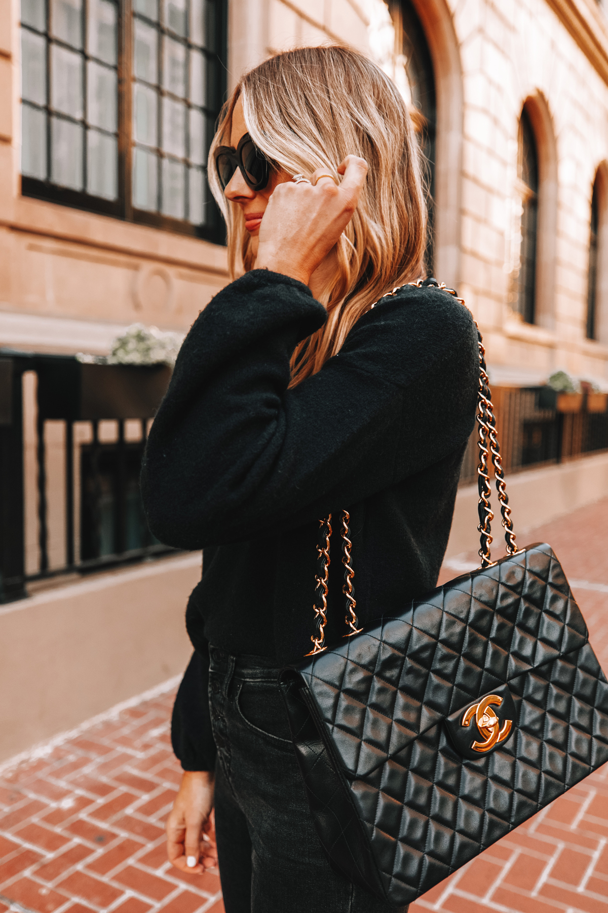 Fashion Jackson Wearing Black Sweater Vintage Chanel Jumbo XL Handbag Black