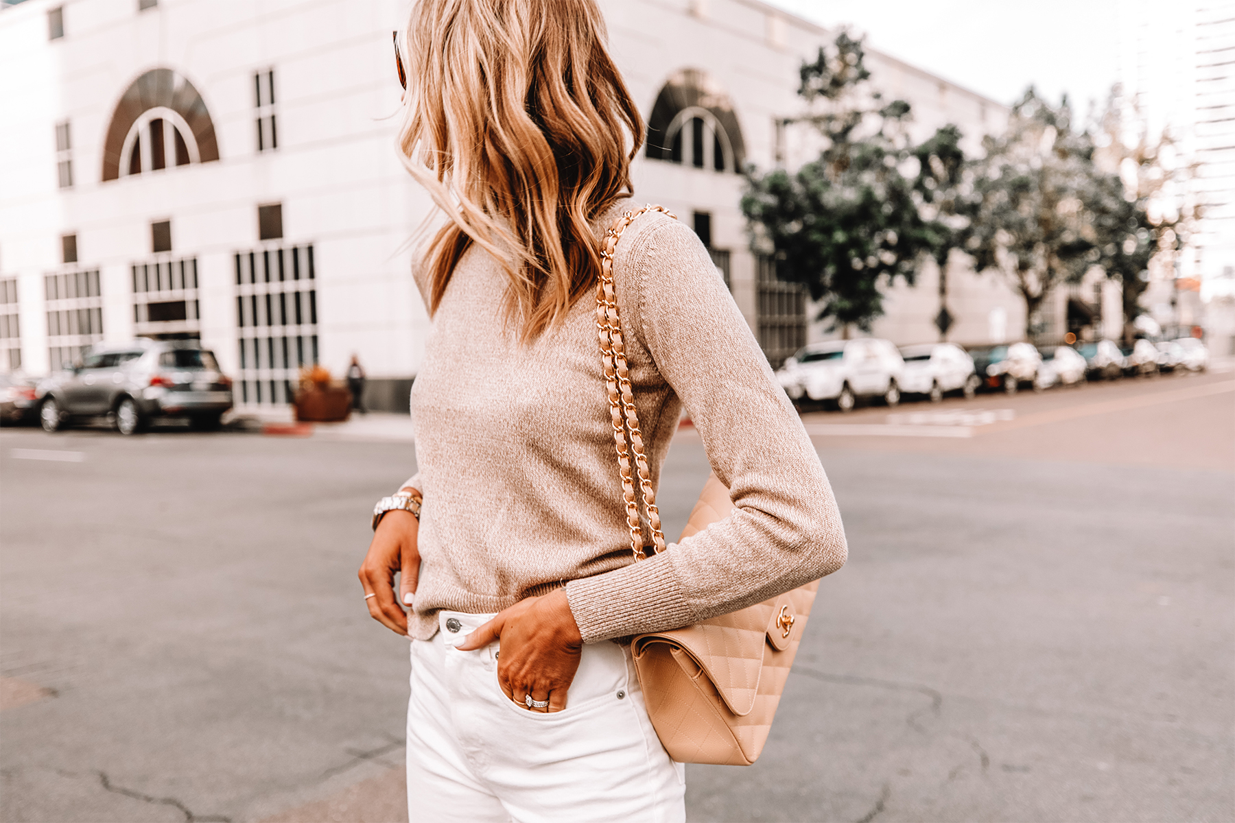 Fashion Jackson Wearing Everlane Beige Sweater White Jeans Beige Chanel Handbag