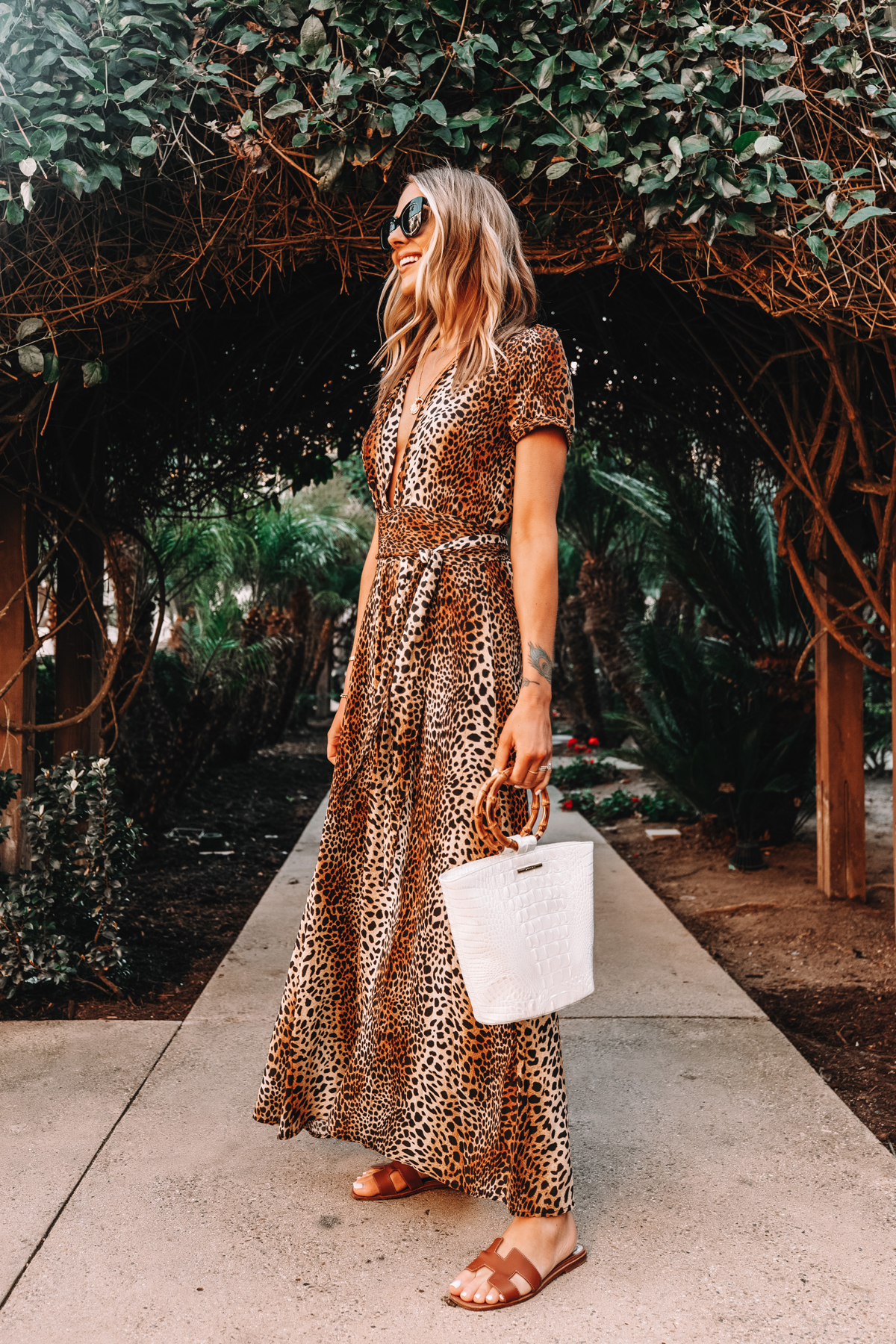 Fashion Jackson Wearing Leopard Maxi Dress Holding Brahmin Mod Bowie White Handbag Hermes Oran Gold Sandals