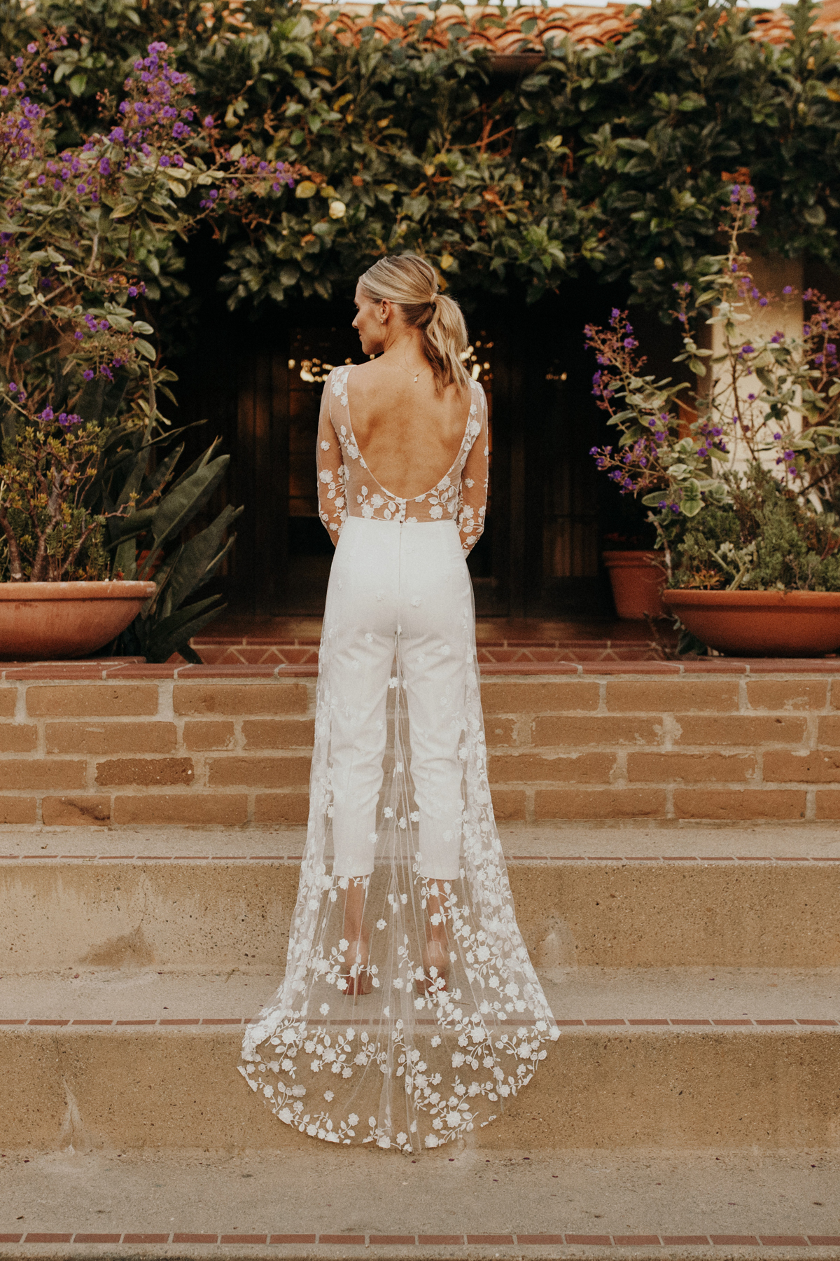 Rime Arodaky patsy white lace bridal embroidered tulle and crepe jumpsuit wedding rehearsal dinner outfit, wedding weekend bridal outfit inspiration