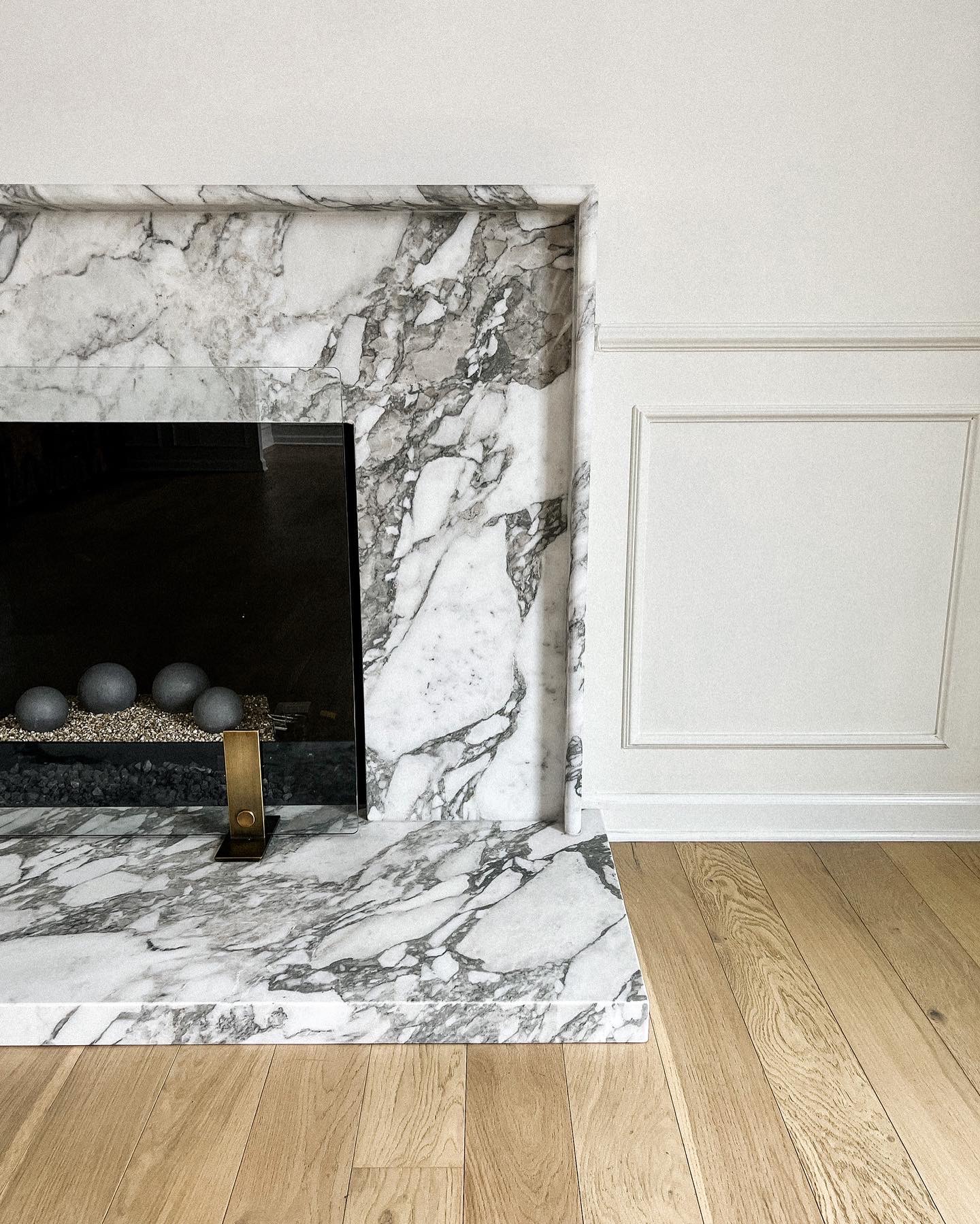 Fashion Jackson transitional interior design marble fireplace