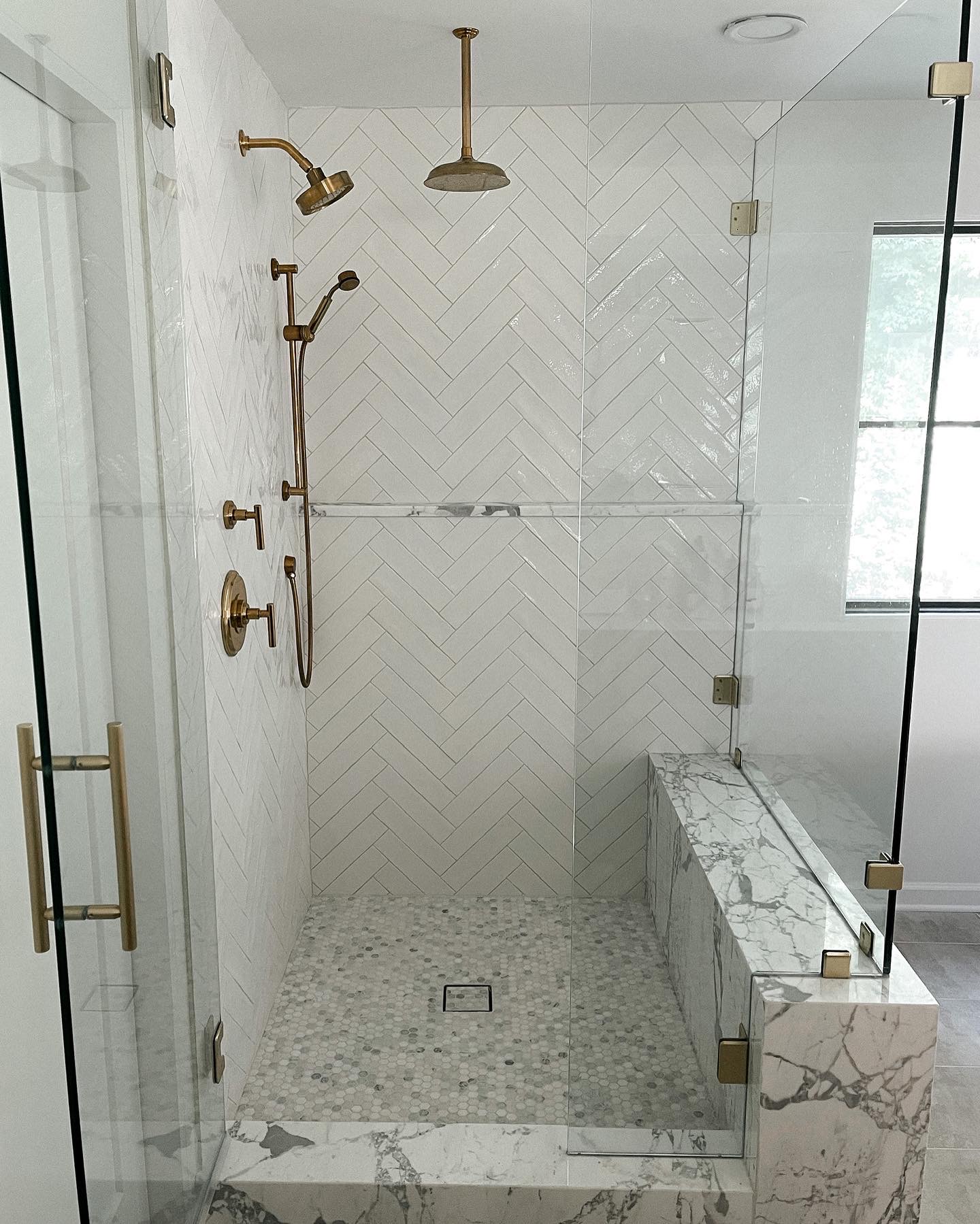 Fashion Jackson transitional bathroom white chevron title marble shower brass shower fixtures