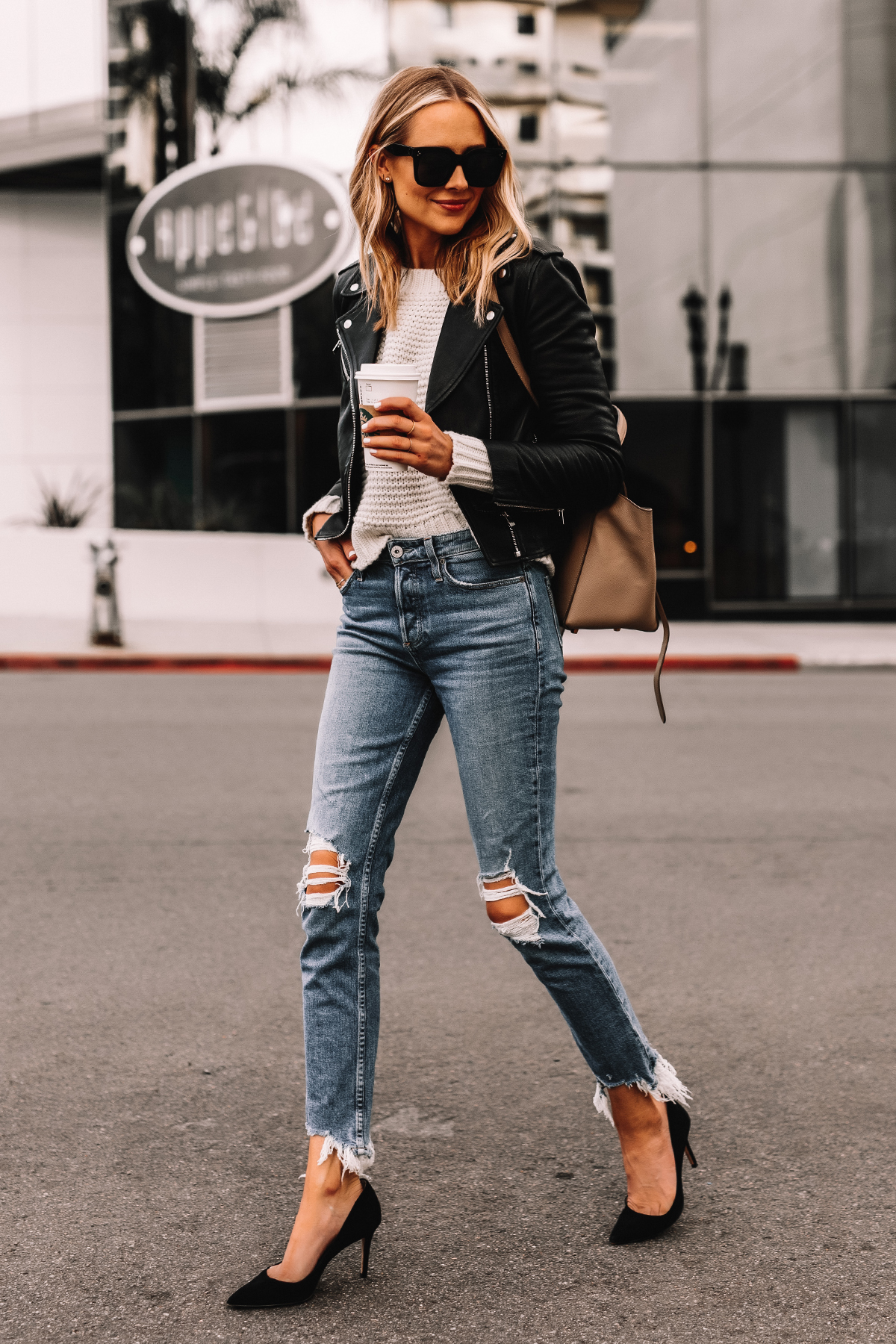 https://fashionjackson.com/wp-content/uploads/2020/04/Fashion-Jackson-Wearing-Black-Leather-Jacket-White-Sweater-Ripped-Jeans-Black-Pumps-Celine-Mini-Belt-Bag-Taupe-1.jpg