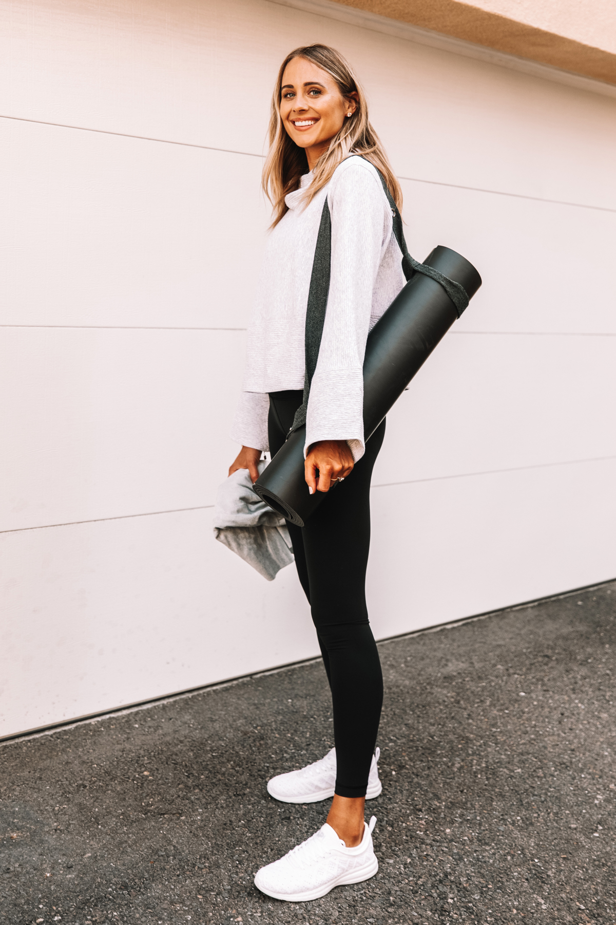 Fashion Jackson Wearing lululemon Grey Hoodie Sweatshirt Black Leggings White Sneakers Black Yoga Mat 1