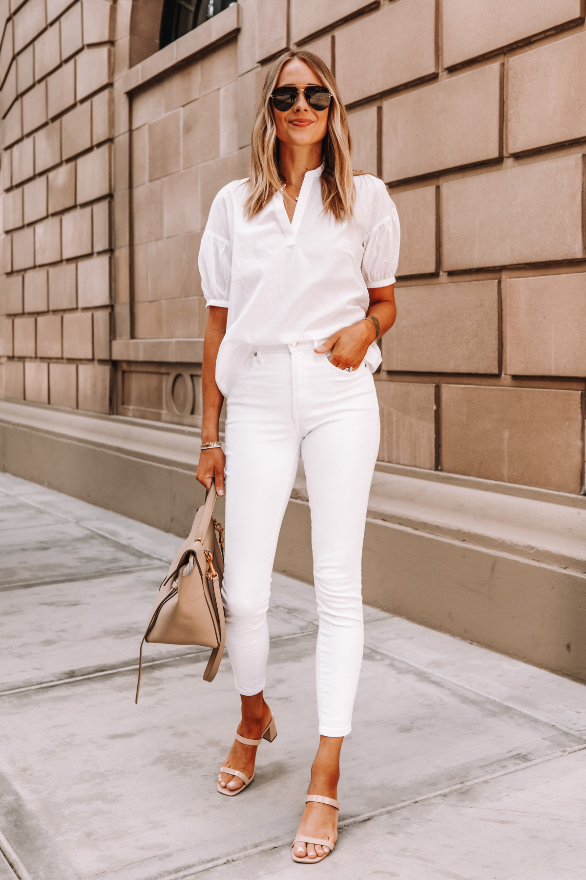 Fashion Jackson Wearing Everlane White Top Everlane White Skinny Jeans Tan Sandals Celine Belt Bag 2