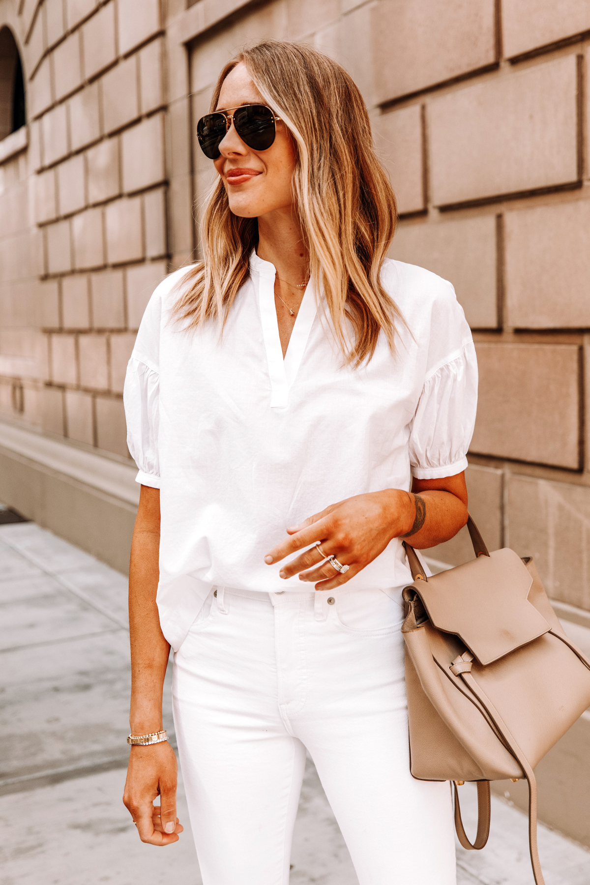 Fashion Jackson Wearing Everlane White Top White Skinny Jeans Celine Belt Bag