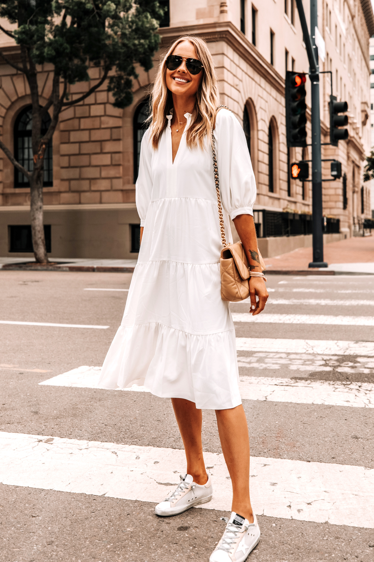 white dress and white sneakers