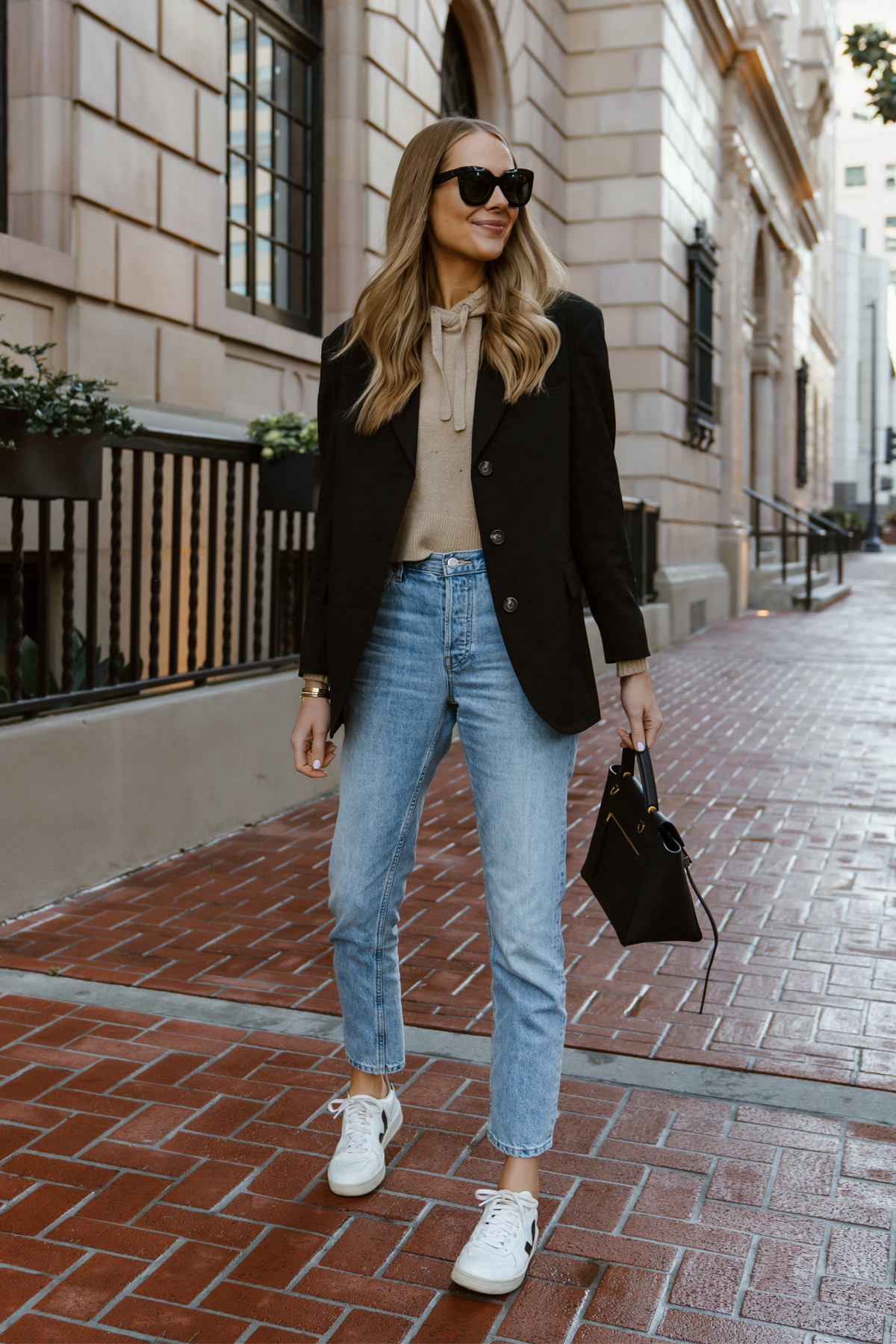 Fashion Jackson Wearing Everlane Black Blazer hoodie and blazer womens outfit jeans and blazer casual outfit veja sneakers outfit