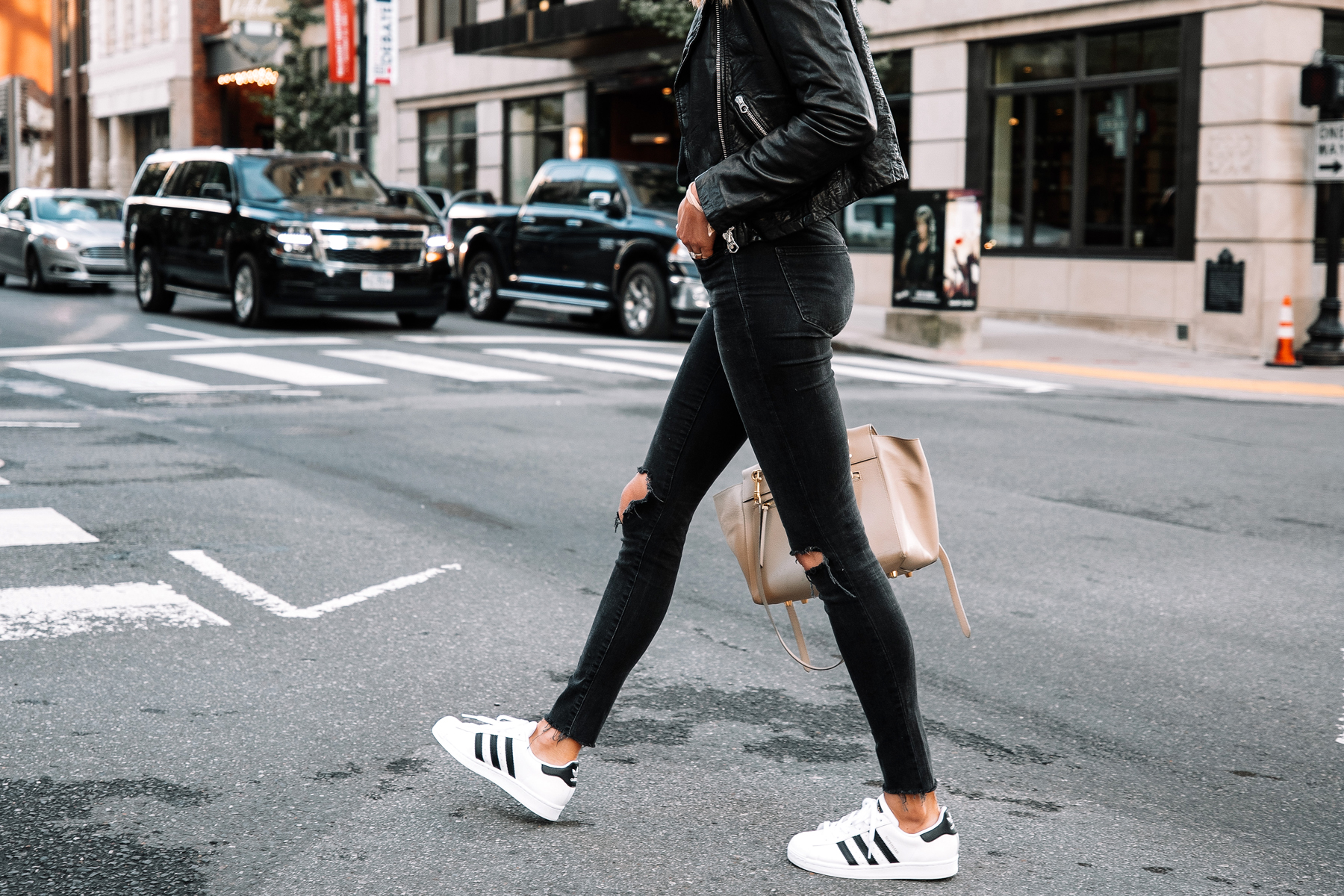 Fashion Jackson Wearing Madewell Black Leather Jacket Black Sweater Black Ripped Skinny Jeans adidas Superstar Sneakers Street Style 4