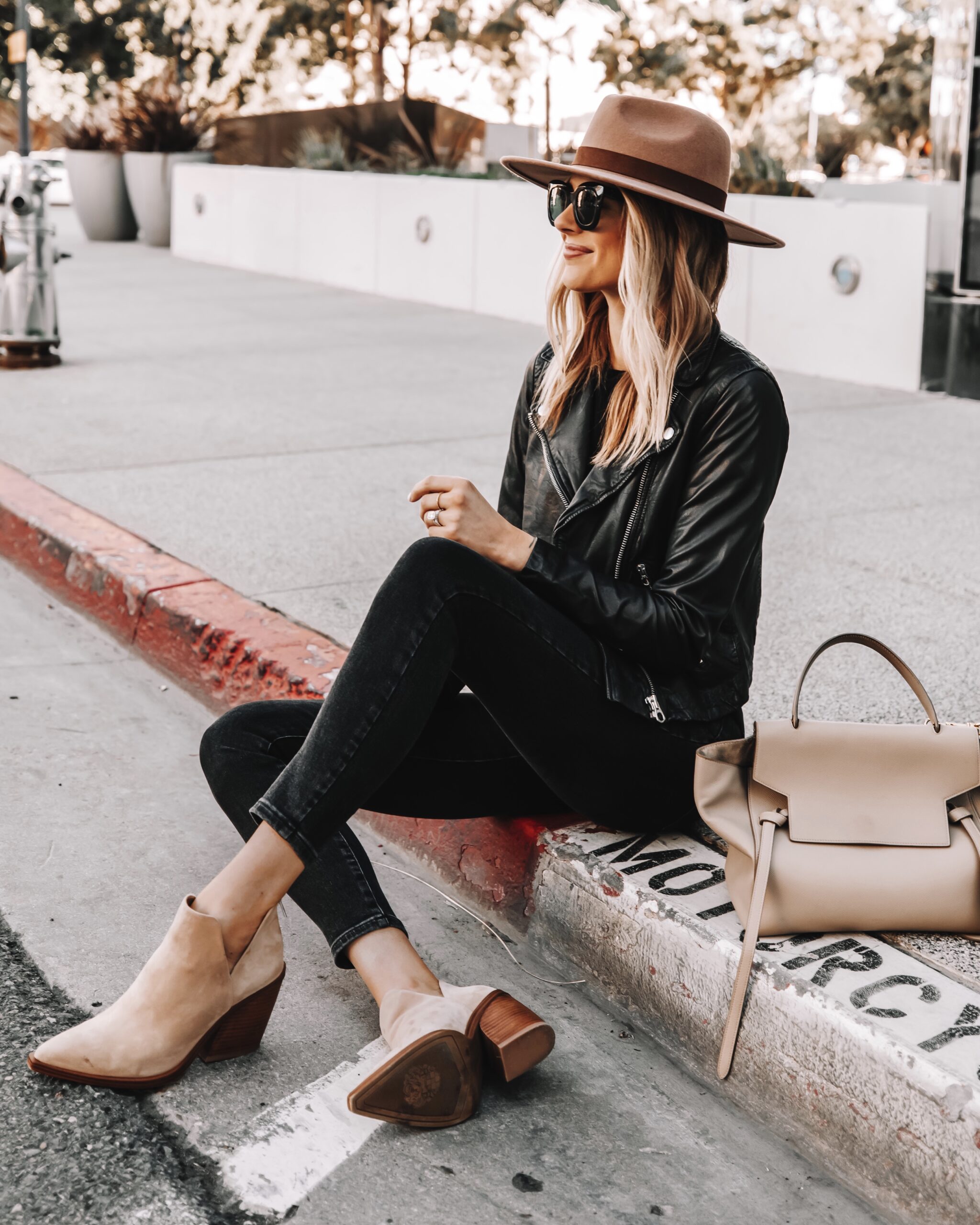 Fashion Jackson Wearing Black Leather Jacket Black Skinny Jeans Tan Suede Booties Tan Fall Hat