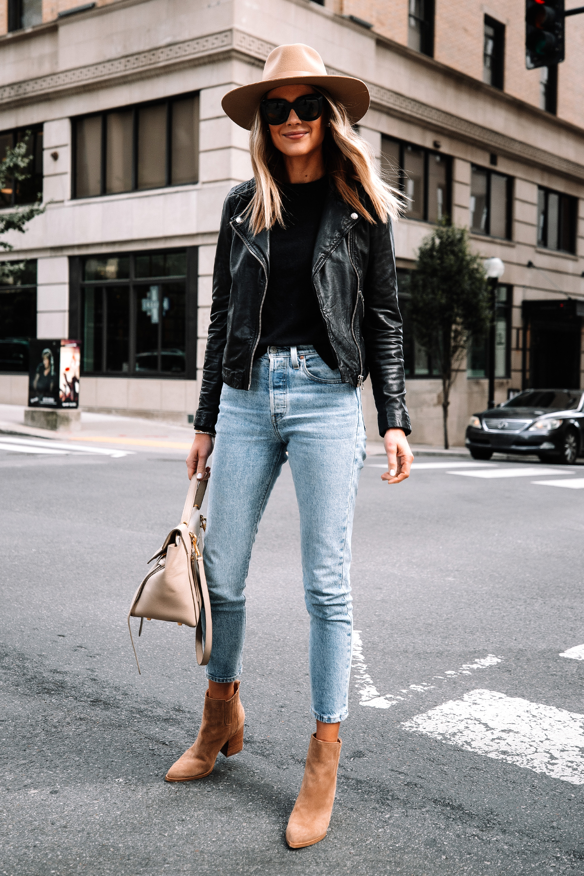 Fashion Jackson Wearing Madewell Black Leather Jacket Black Sweater Levis Jeans Tan Suede Booties Rag and Bone Tan Fall Hat Street Style