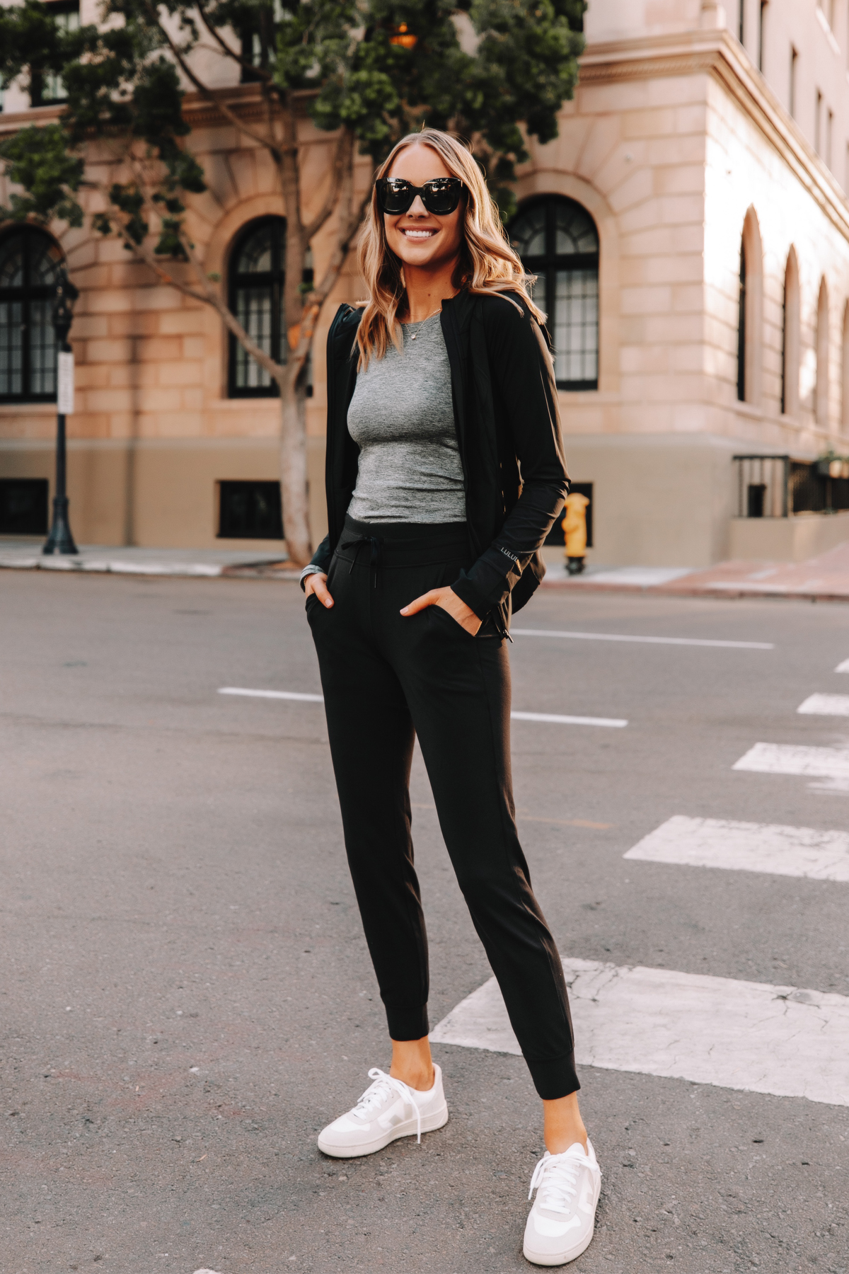 https://fashionjackson.com/wp-content/uploads/2020/10/Fashion-Jackson-Wearing-lululemon-Ready-to-Rulu-Black-Joggers-Veja-Sneakers-Black-Jacket-Grey-Top.jpg