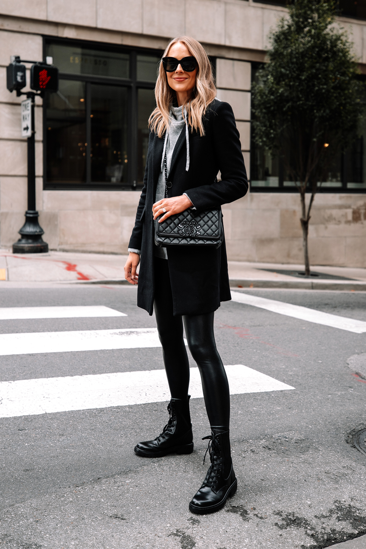 https://fashionjackson.com/wp-content/uploads/2020/11/Fashion-Jackson-Wearing-Black-Wool-Coat-Grey-Sweater-Commando-Black-Faux-Leather-Leggings-Sam-Edelman-Black-Combat-Boots-Street-Style-Outfit-3.jpg