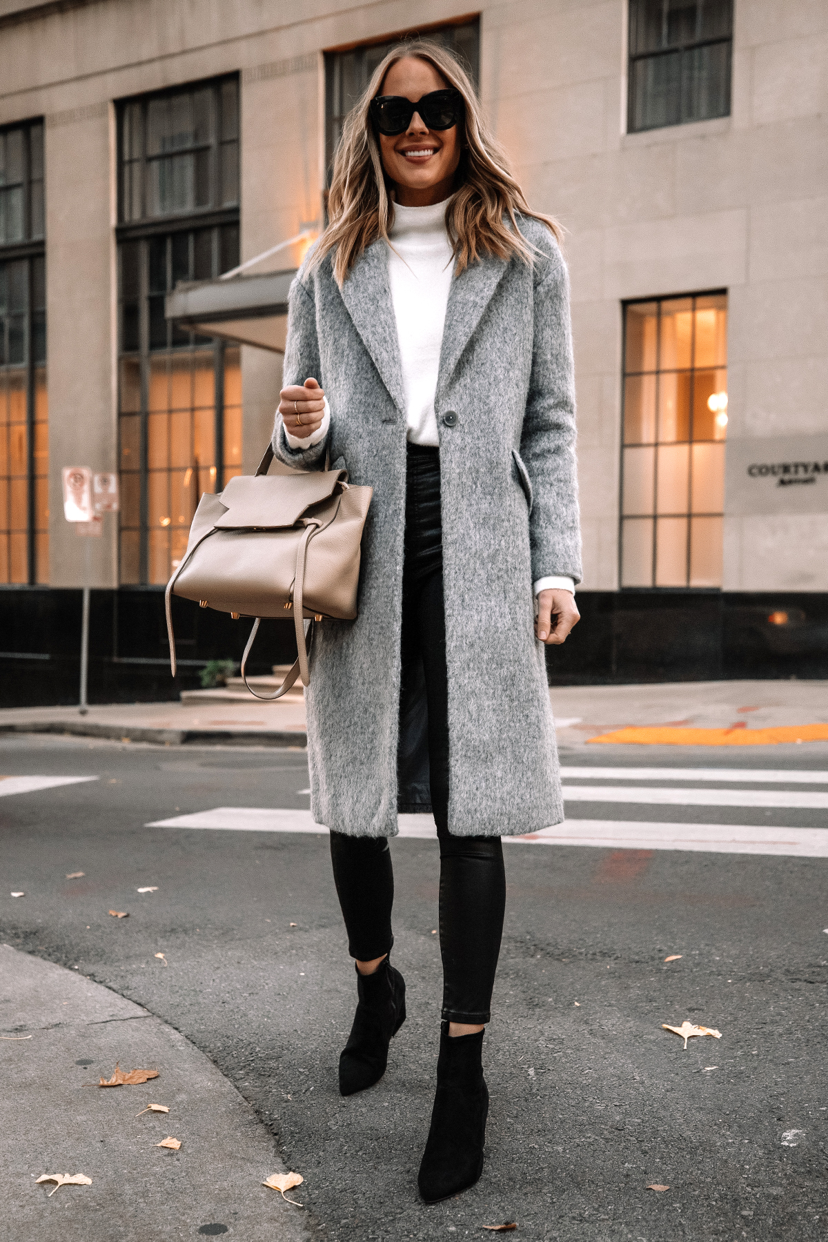 Fashion Jackson Wearing Express Long Grey Coat White Sweater Black Coated Skinny Jeans Black Suede Booties Winter Outfit Street Style