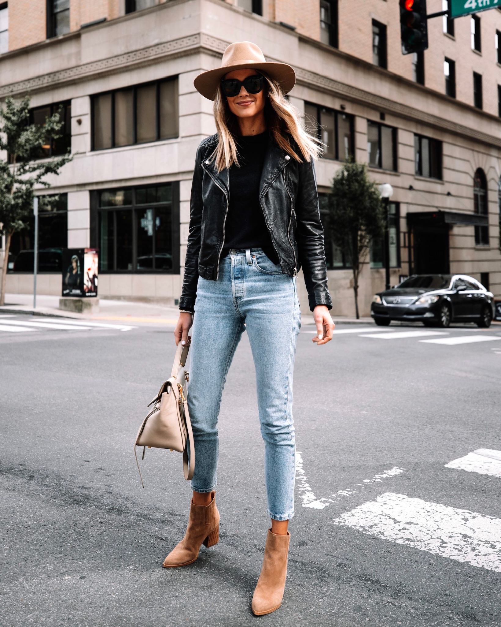 Denim dress shop with leather jacket