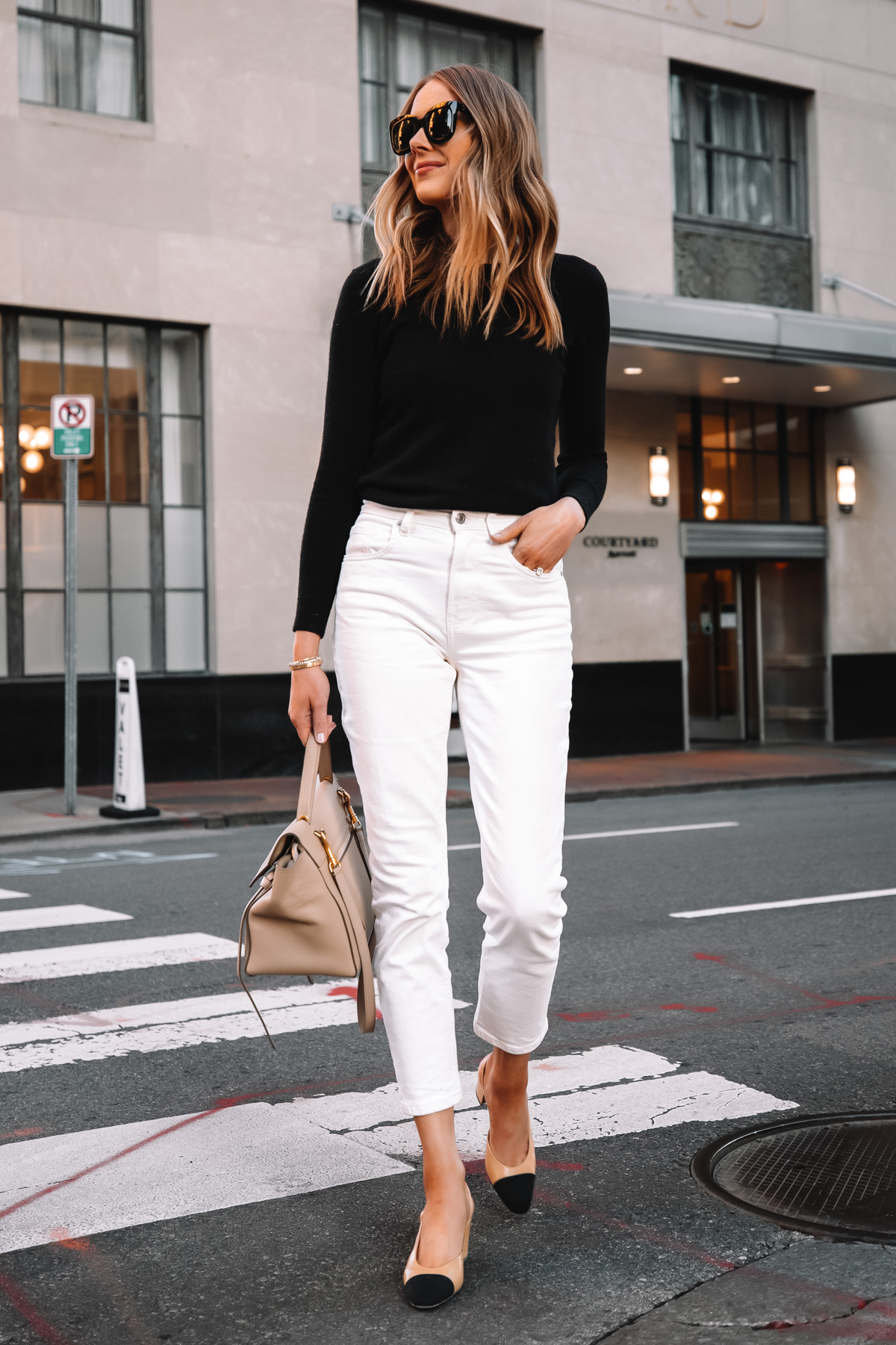 Fashion Jackson Wearing Everlane Black Cashmere Sweater Everlane White Jeans Chanel Slingbacks Celine Belt Bag Street Style 4