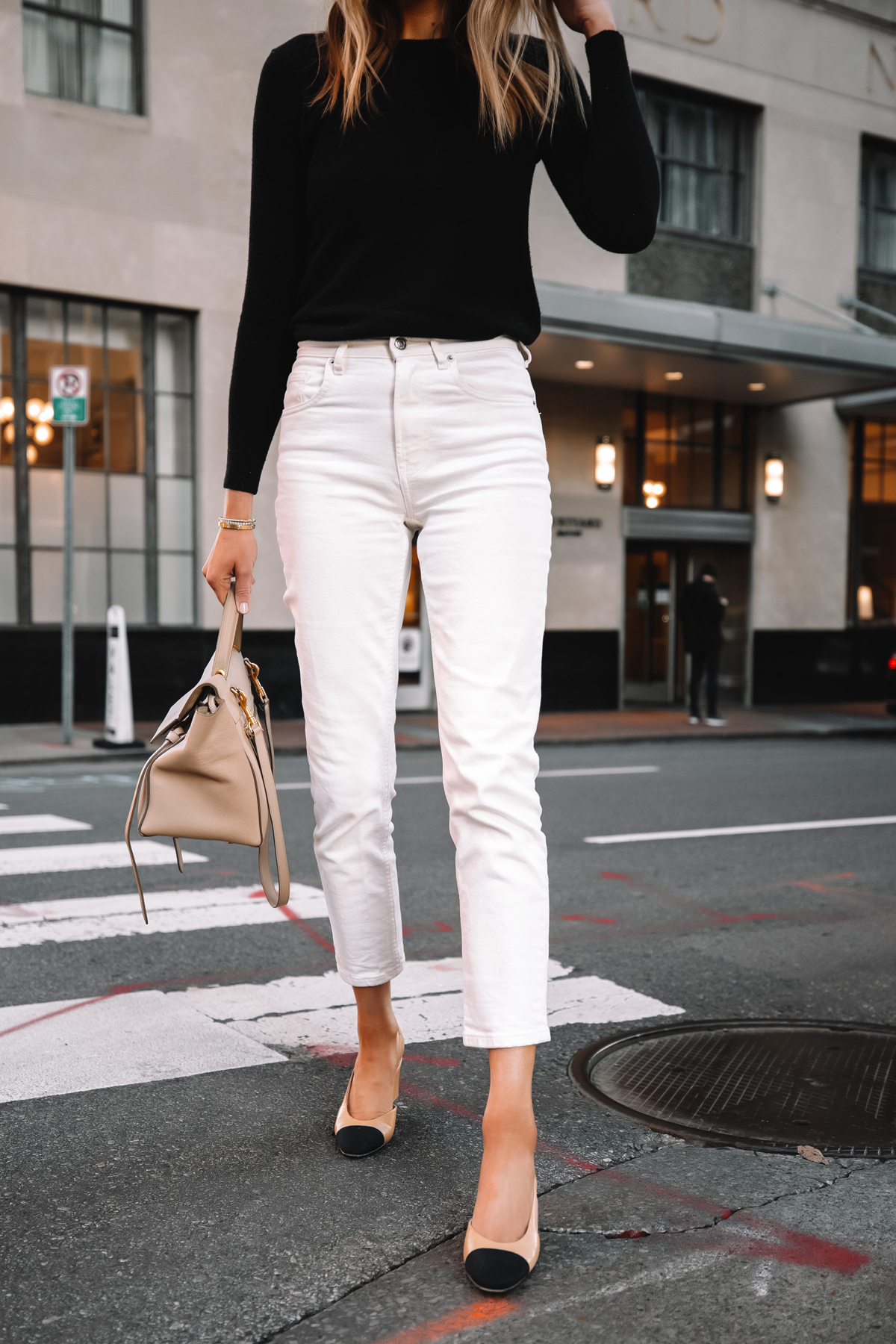 Fashion Jackson Wearing Everlane Black Cashmere Sweater Everlane White Jeans Chanel Slingbacks Celine Belt Bag