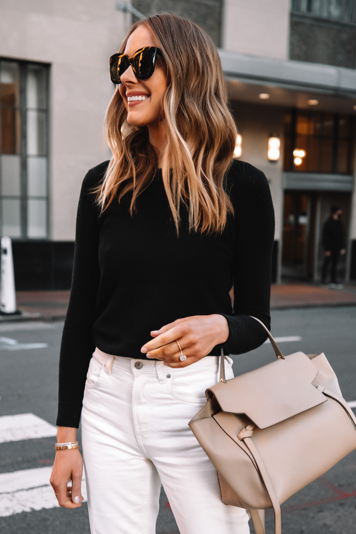 Fashion Jackson Wearing Everlane Black Cashmere Sweater White Jeans Celine Belt Bag Celine Sunglasses