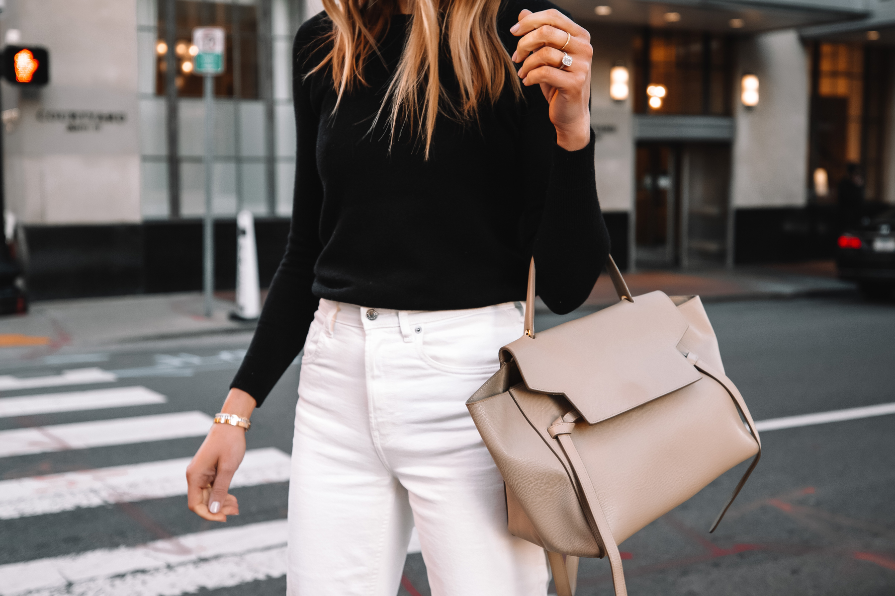 Fashion Jackson Wearing Everlane Black Cashmere Sweater White Jeans Celine Belt Bag