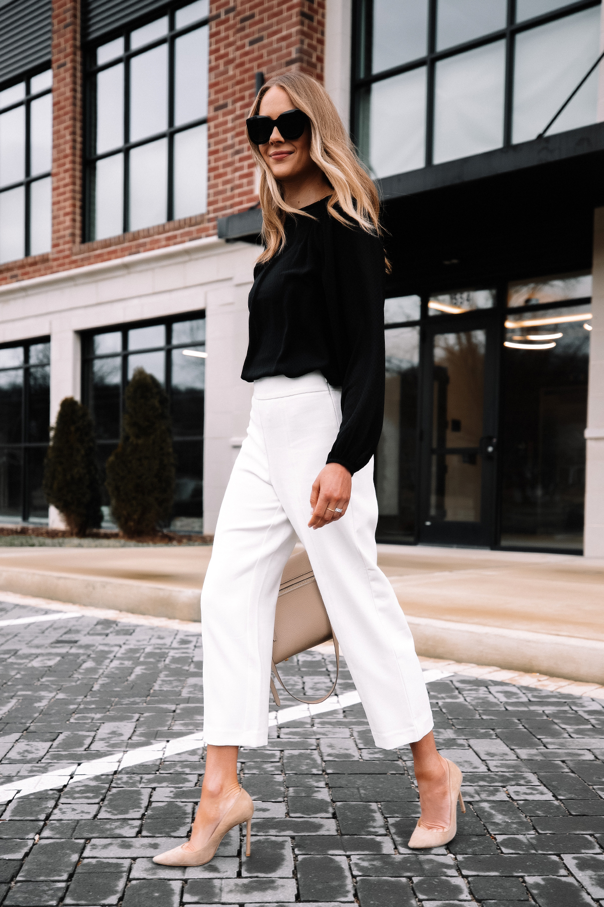 Free Photo | Women's white oversized shirt fashion and black pants