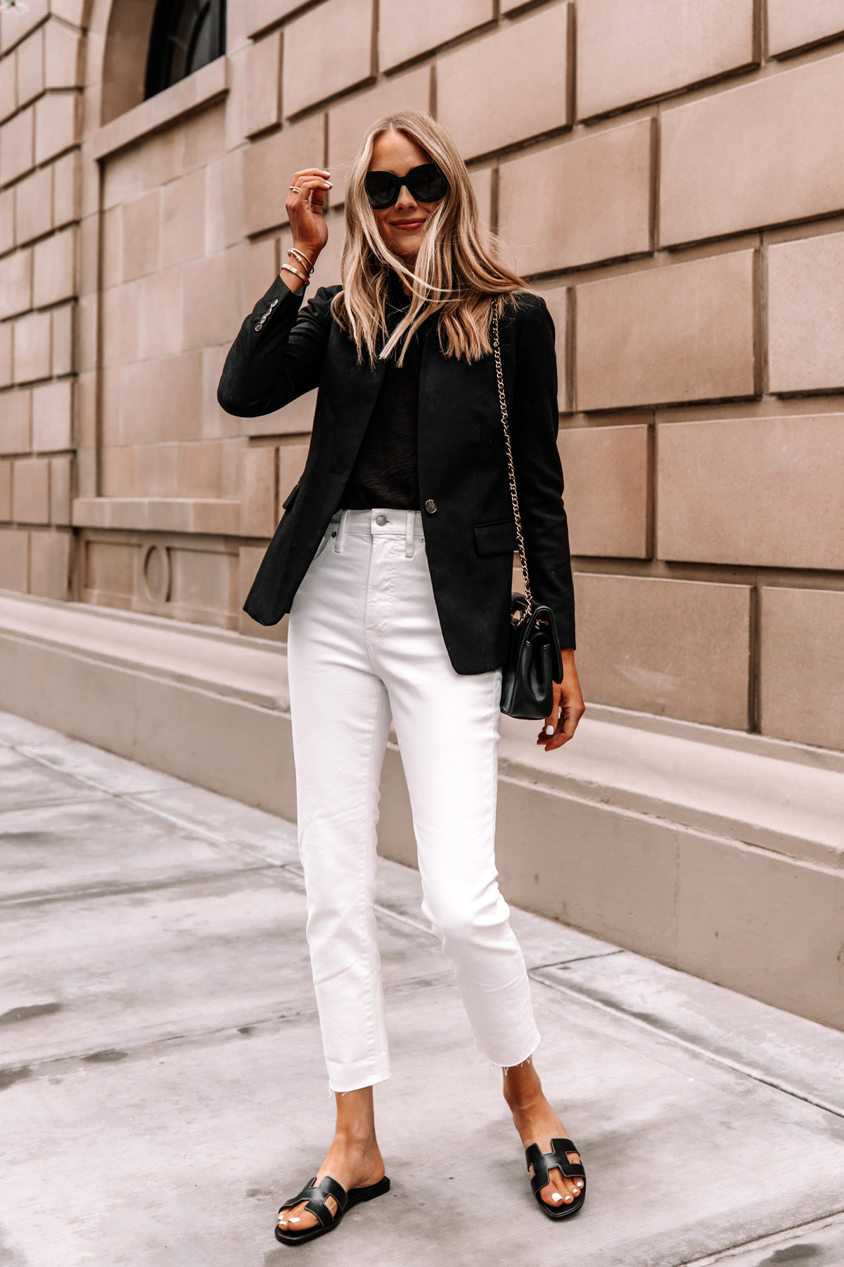 Black shirt on sale white jeans outfit