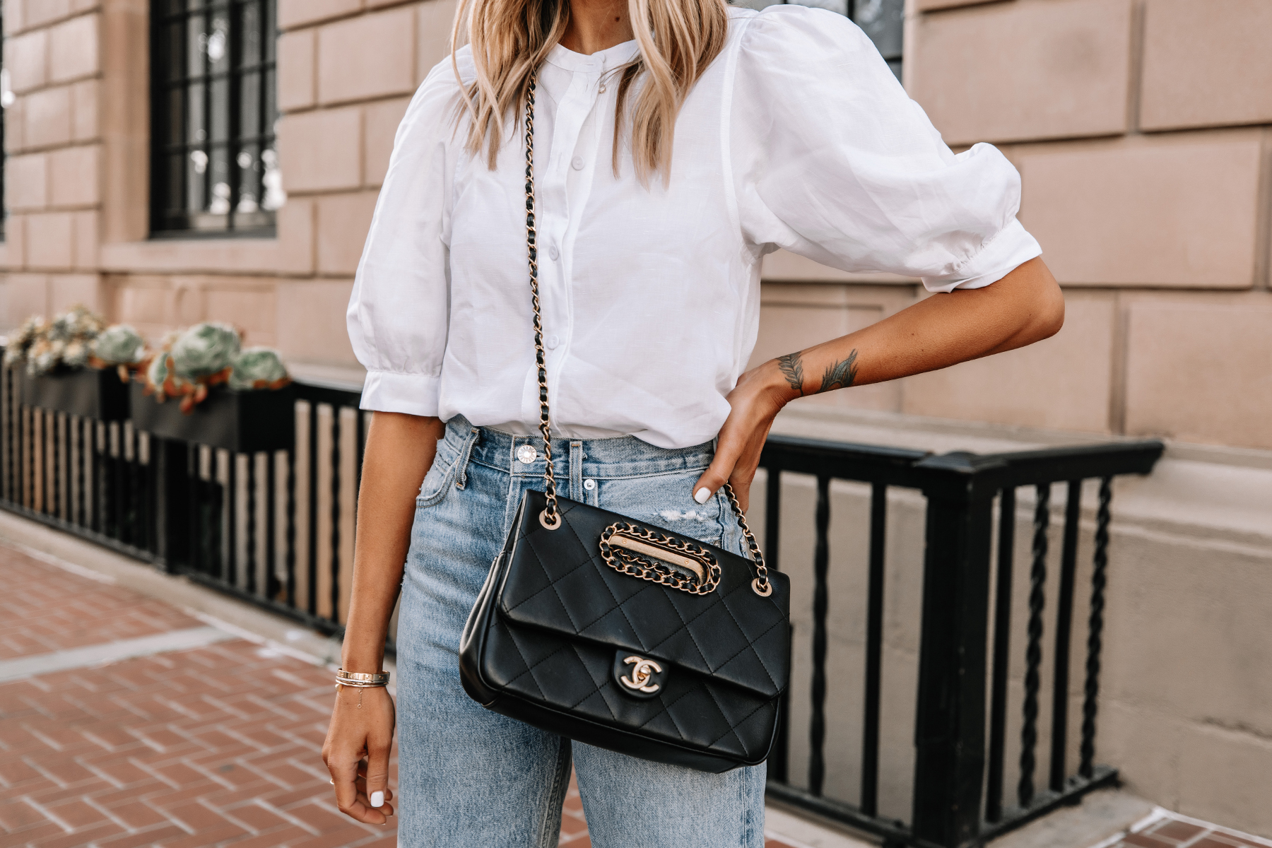 Fashion Jackson Wearing White Button Up Puff Sleeve Top Ripped Jeans Black Chanel Handbag 1