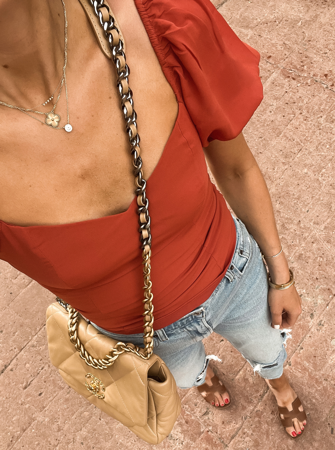 Fashion Jackson Wearing Abercrombie Red Puff Sleeve Top Abercrombie Ripped Jeans Hermes Oran Tan Sandals Chanel 19 Beige Handbag
