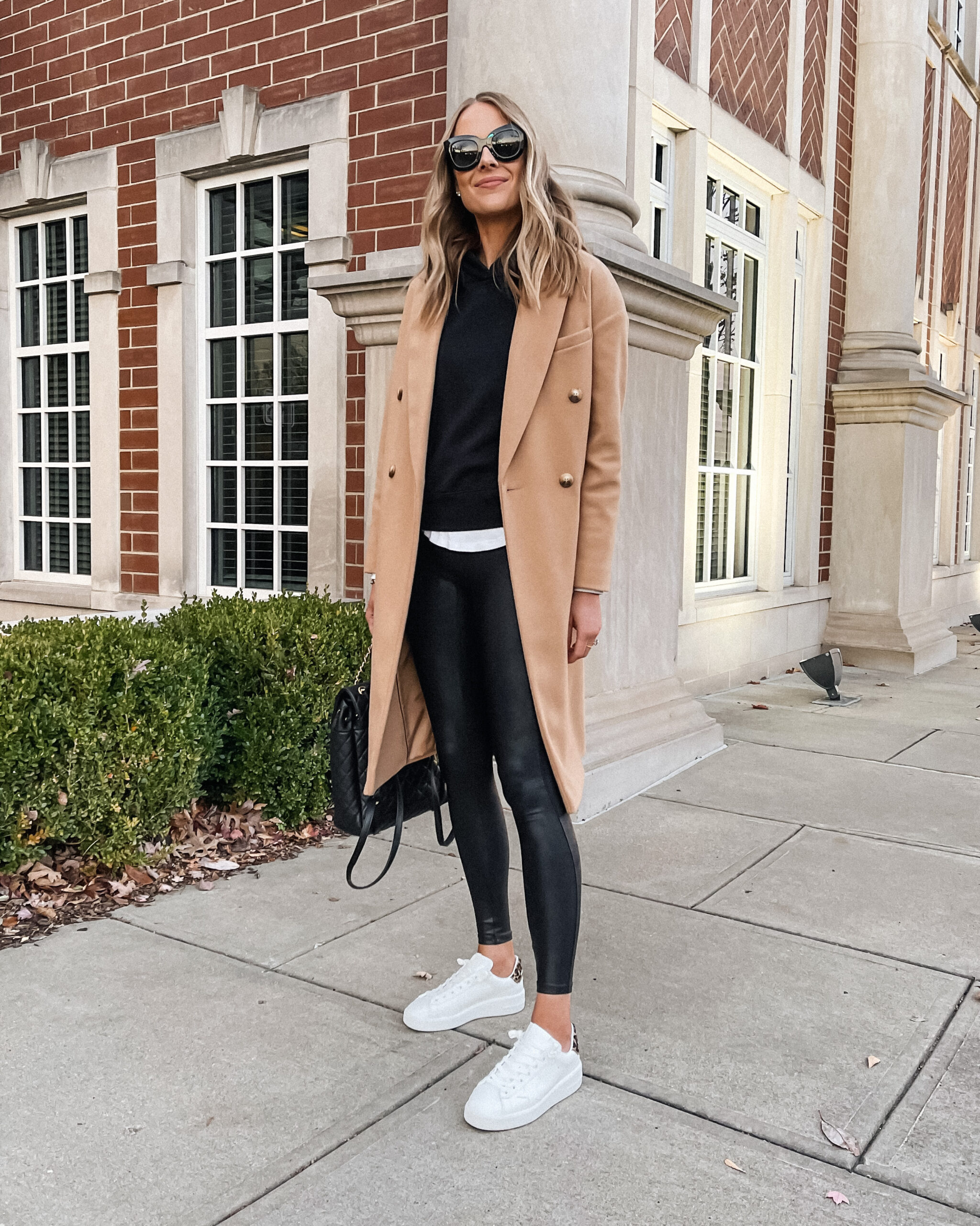 Fashion Jackson Wearing Camel Coat Black Sweatshirt Spanx Faux Leather Leggings Golden Goose Sneakers