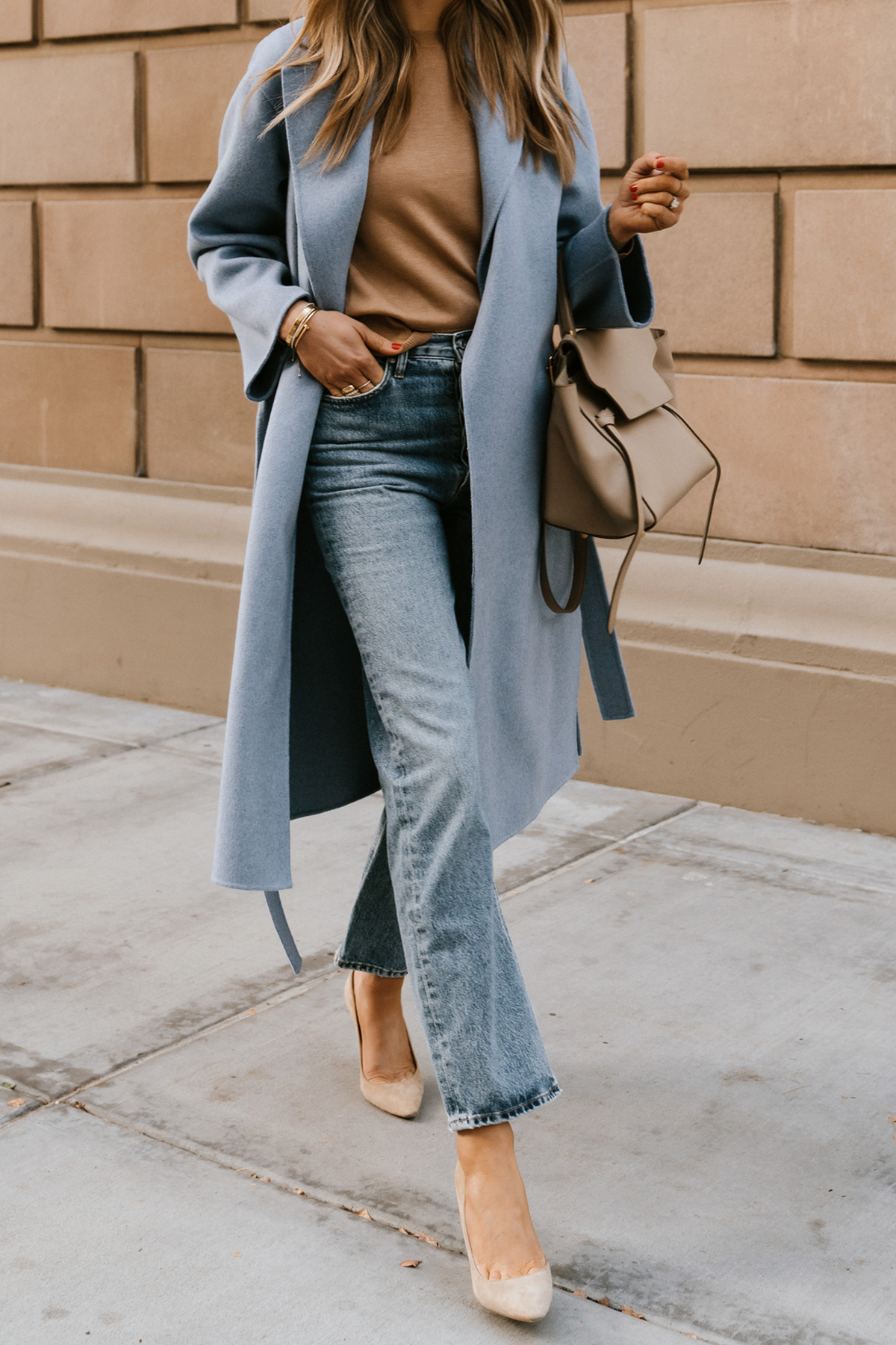 Fashion Jackson Wearing Blue Wrap Coat Camel Sweater AGOLDE 90s Jeans Jimmy Choo Nude Pumps Celine Belt Bag Winter Street Style 1