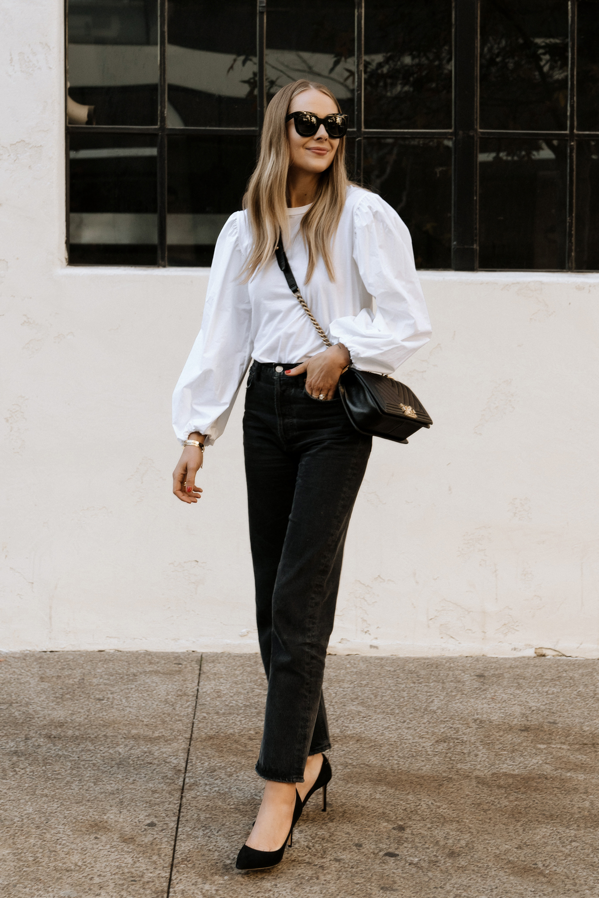 White top black store pants