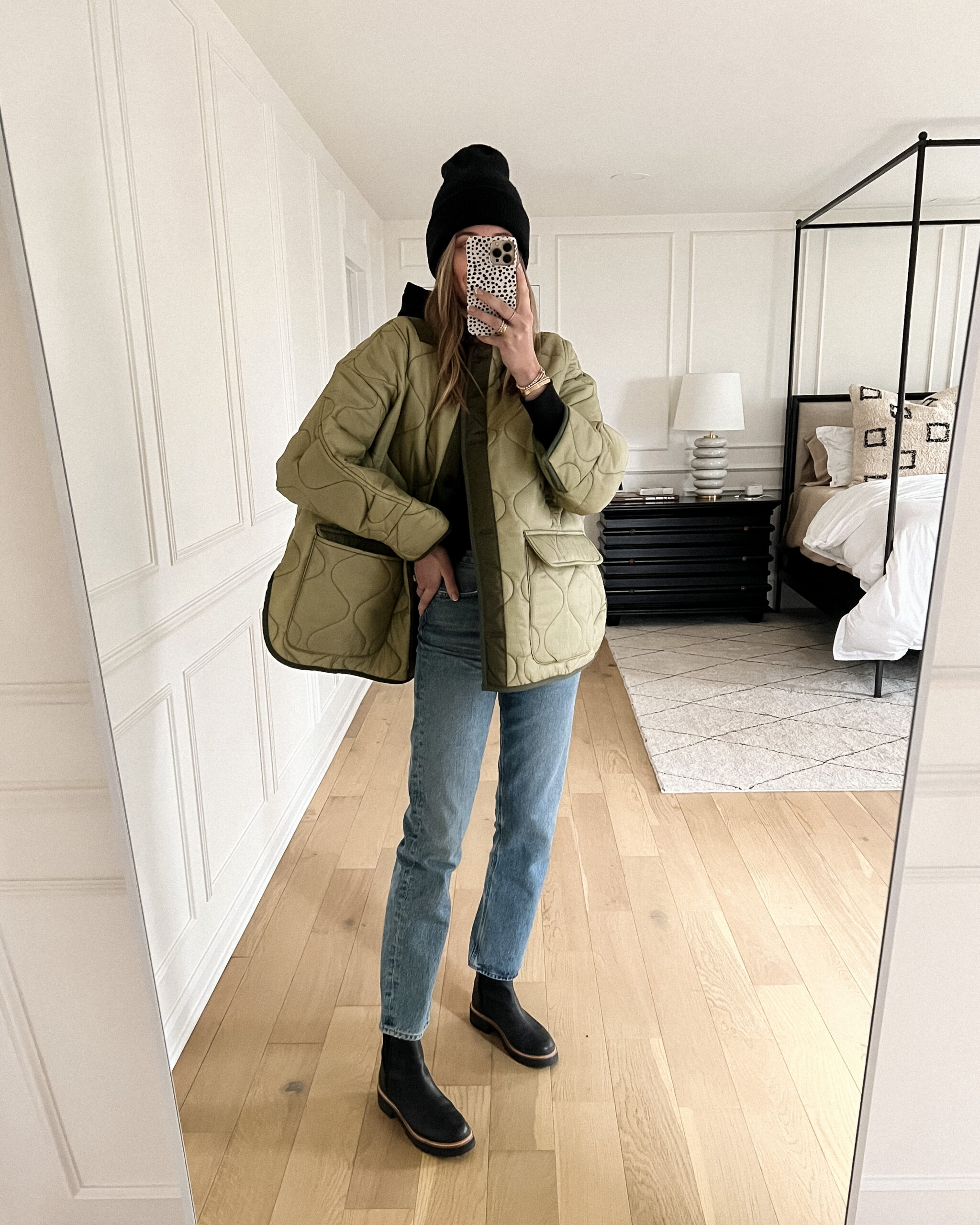 Fashion Jackson Wearing Frankie Shop Green Quilted Jacket AGOLDE 90s Jeans Black Boots Black Beanie
