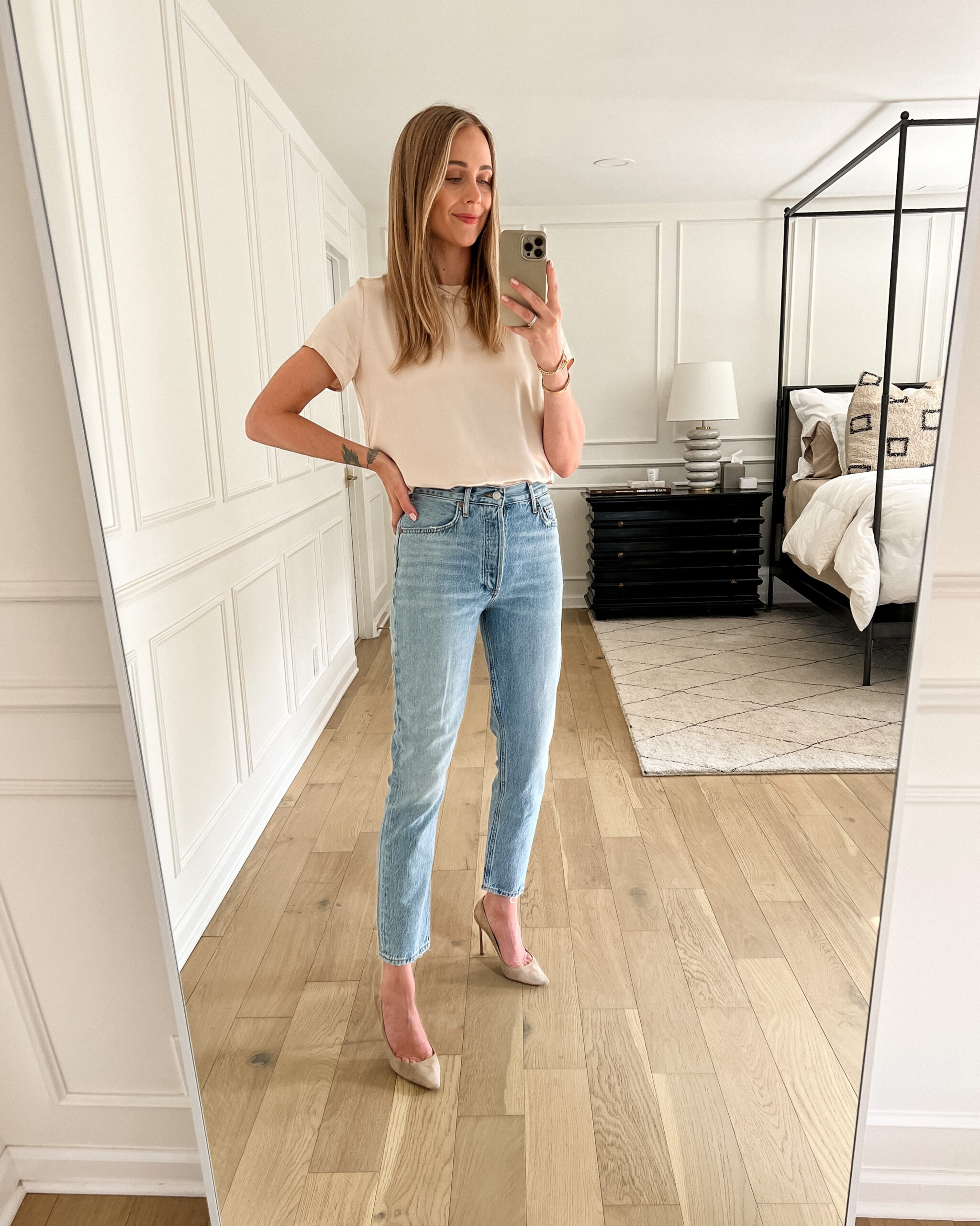 Fashion Jackson Wearing AGOLDE Fen High Rise Relaxed Tapered Jeans Nude Pumps Beige Top
